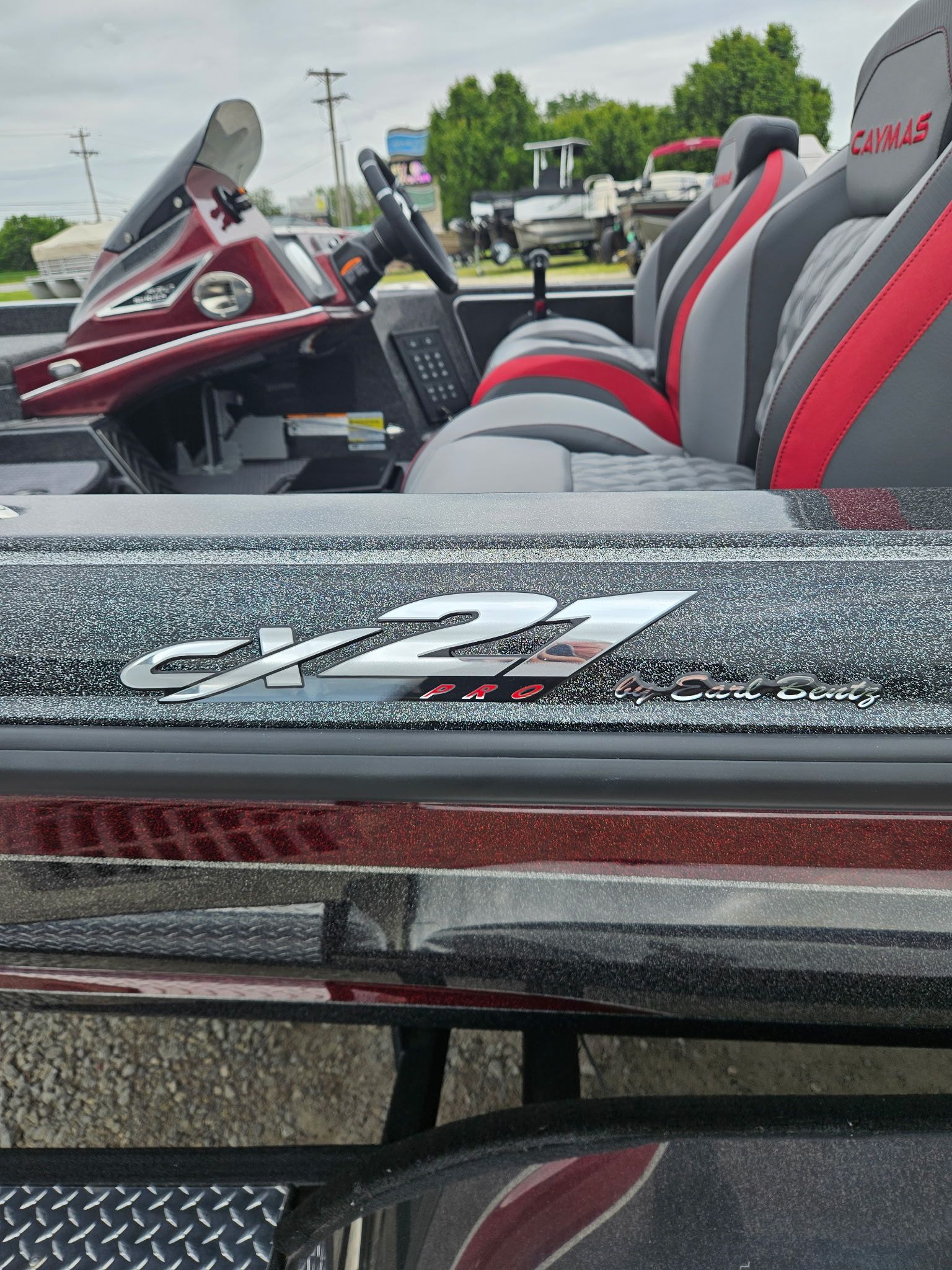 Caymas CX 21 PRO 2027 interior with red seats.