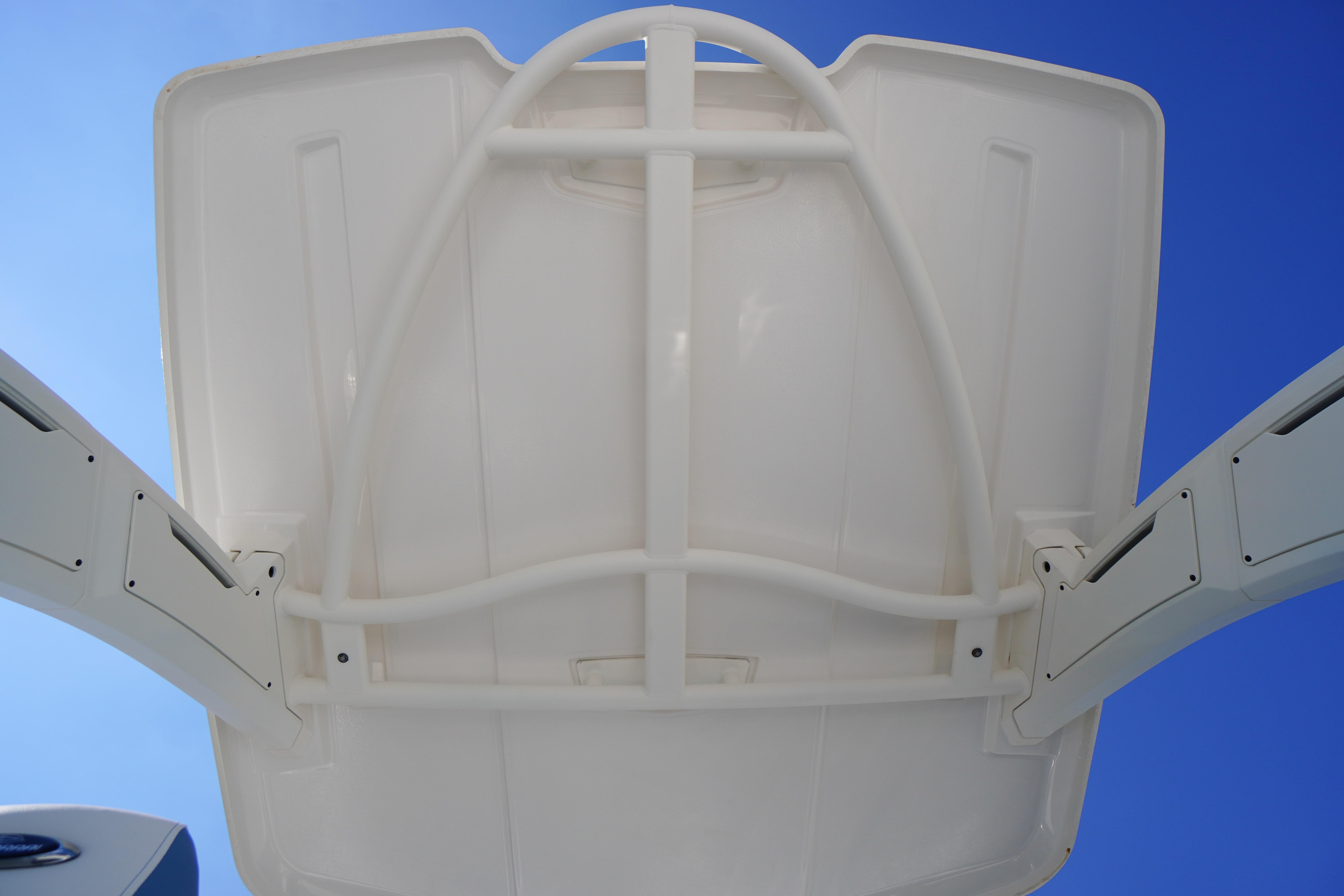 2026 Chaparral 270 OSX boat canopy against clear blue sky.