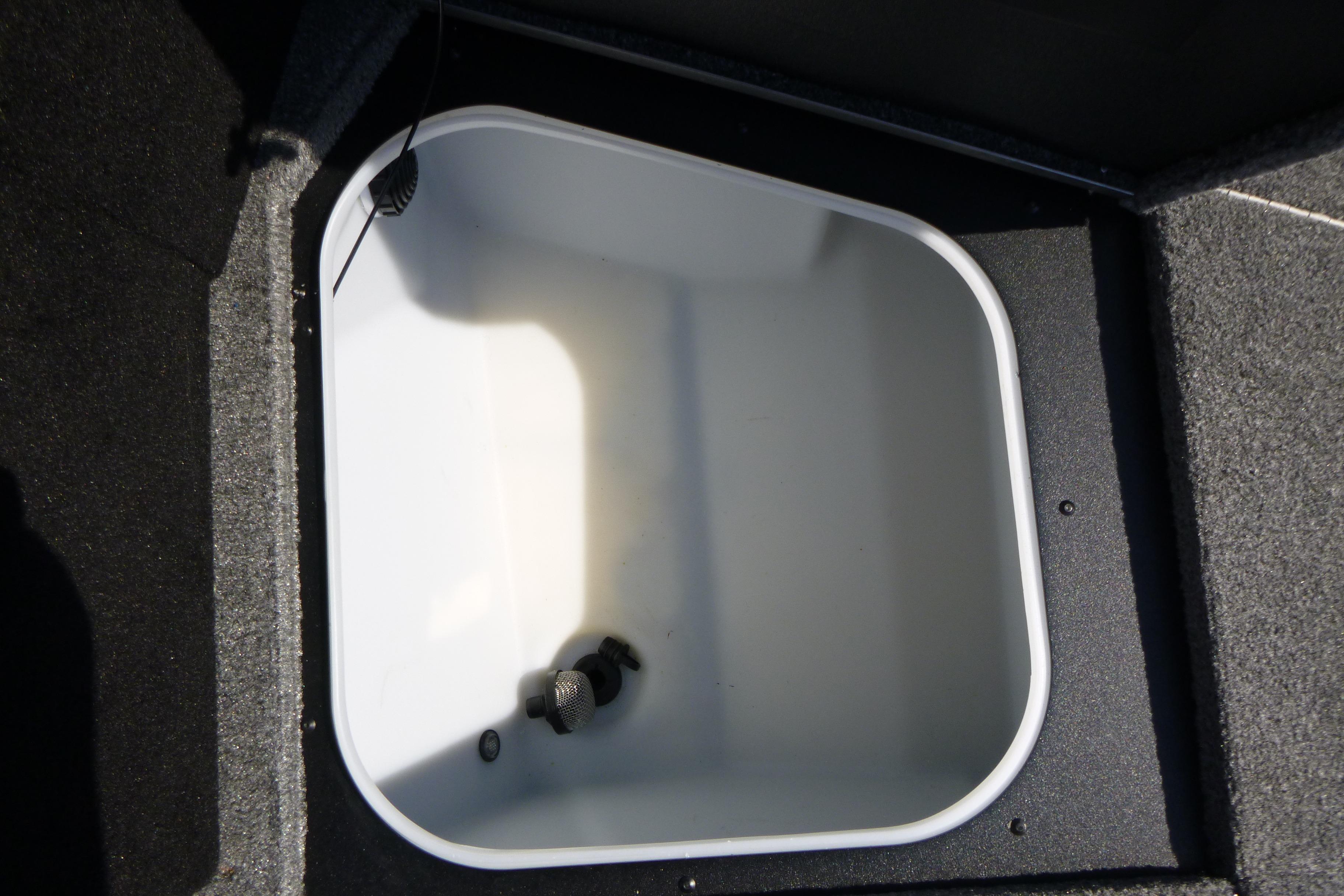 2024 Alumacraft Competitor 185X Sport livewell interior with drain and aerator.
