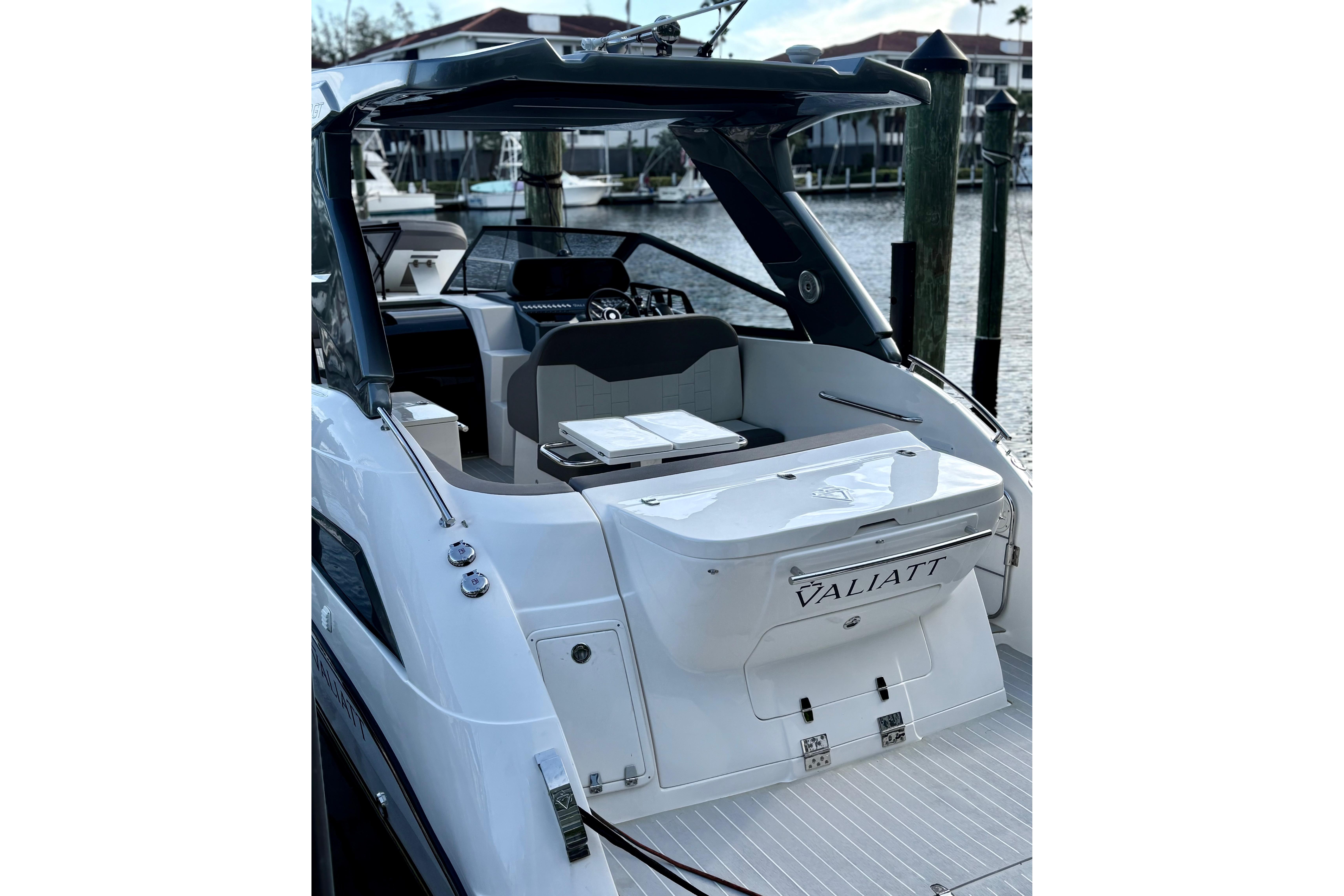 2025 Valiatt 350GT luxury yacht docked at marina, showcasing sleek design and modern features.