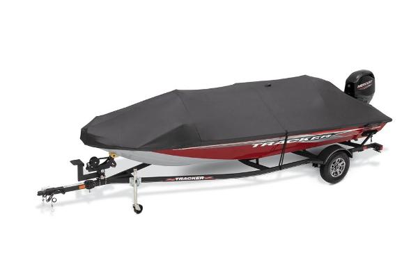 A 2021 Tracker Pro Team 175 TXW boat with a cover on a trailer.