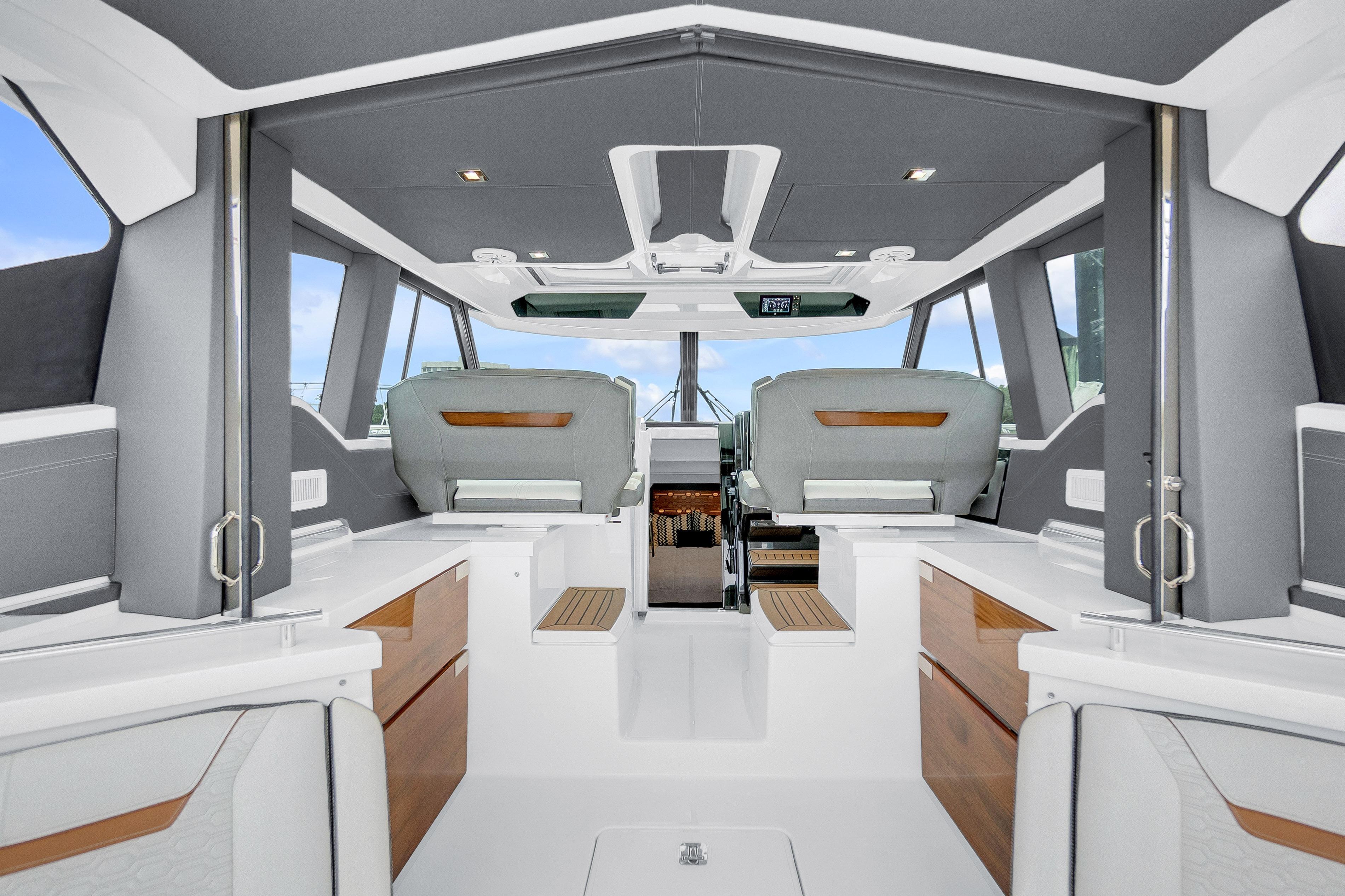 Interior of 2021 Tiara Sport 43 LE yacht, featuring modern design and luxurious seating.
