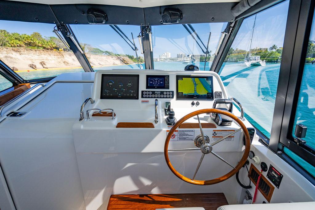 Interior view of 2024 MJM 4 boat cockpit with modern navigation.