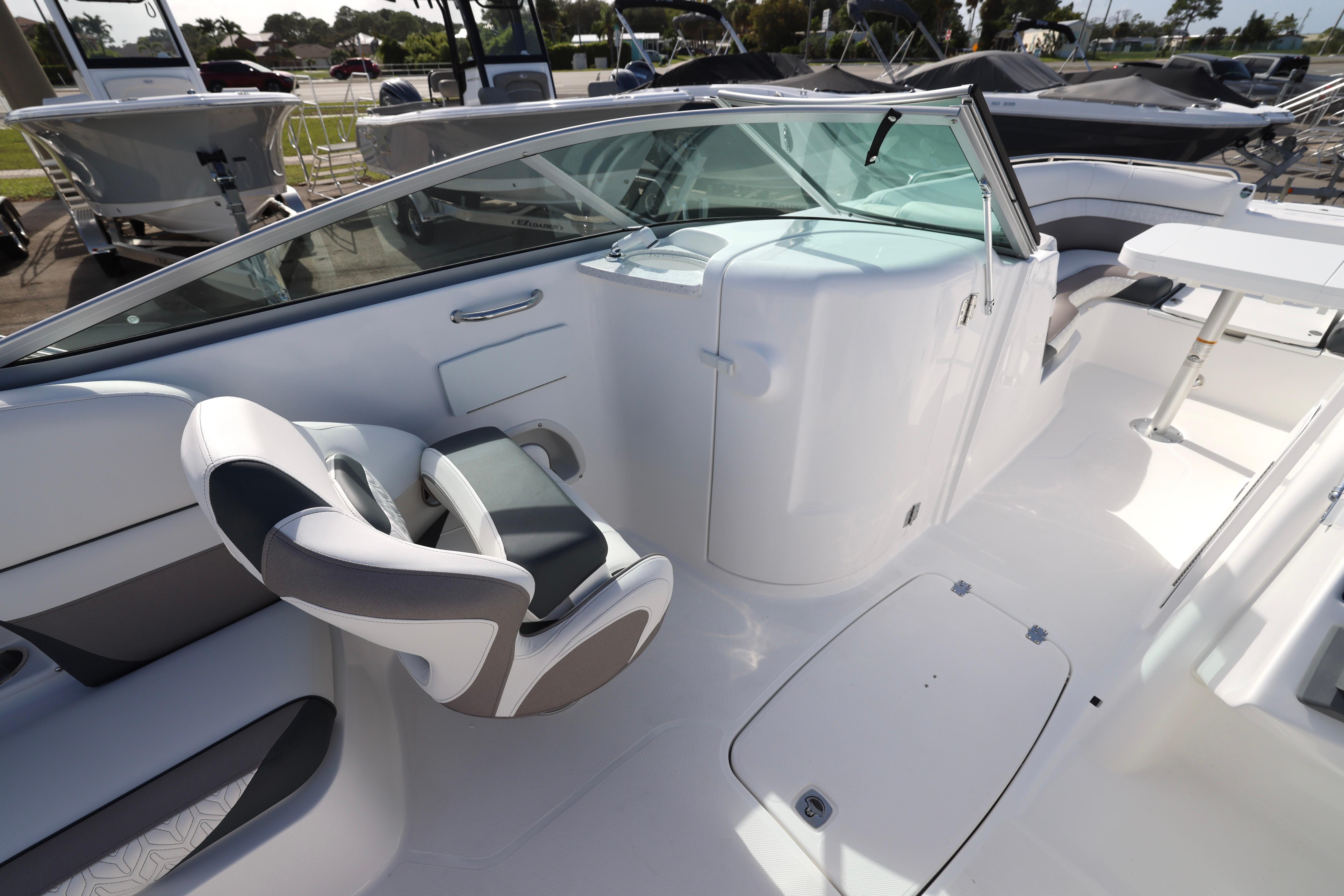 2026 Hurricane SunDeck 2486 OB boat interior with modern seating and sleek design.