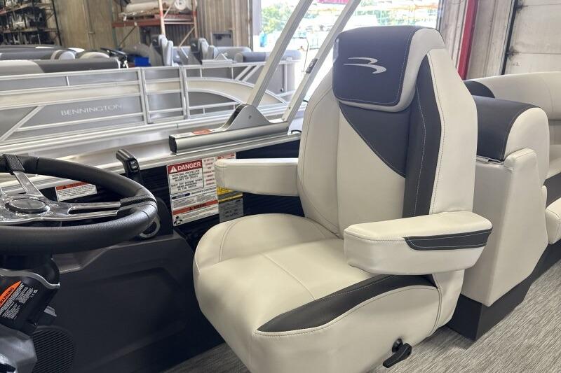 Captain's chair in 2026 Bennington 22 SSRSF pontoon boat, featuring sleek design and comfortable seating.