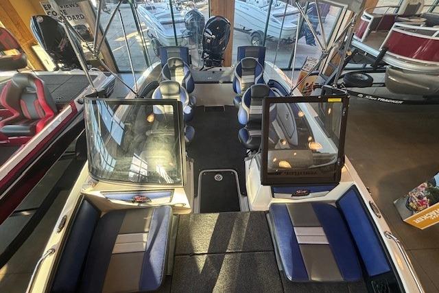 2026 Ranger 1850MS boat interior with blue seating and open windshield.