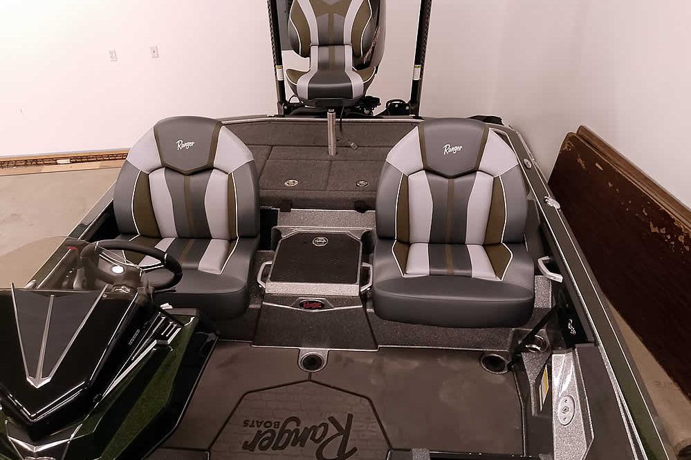 2026 Ranger Z519R Cup-Equipped boat interior with dual seats and steering wheel.