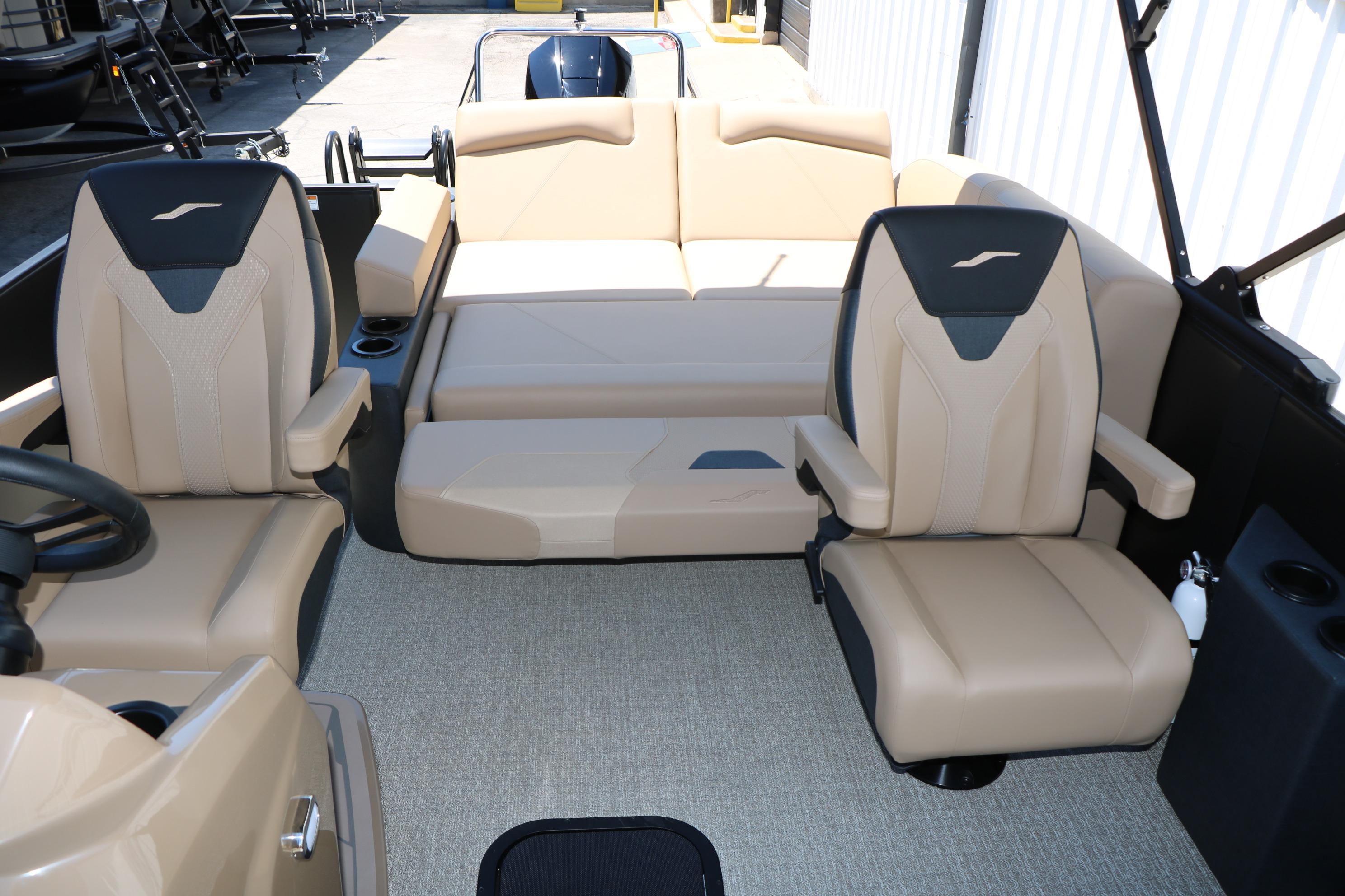 Interior of 2026 Evotti 521CS boat with beige seating and modern design.