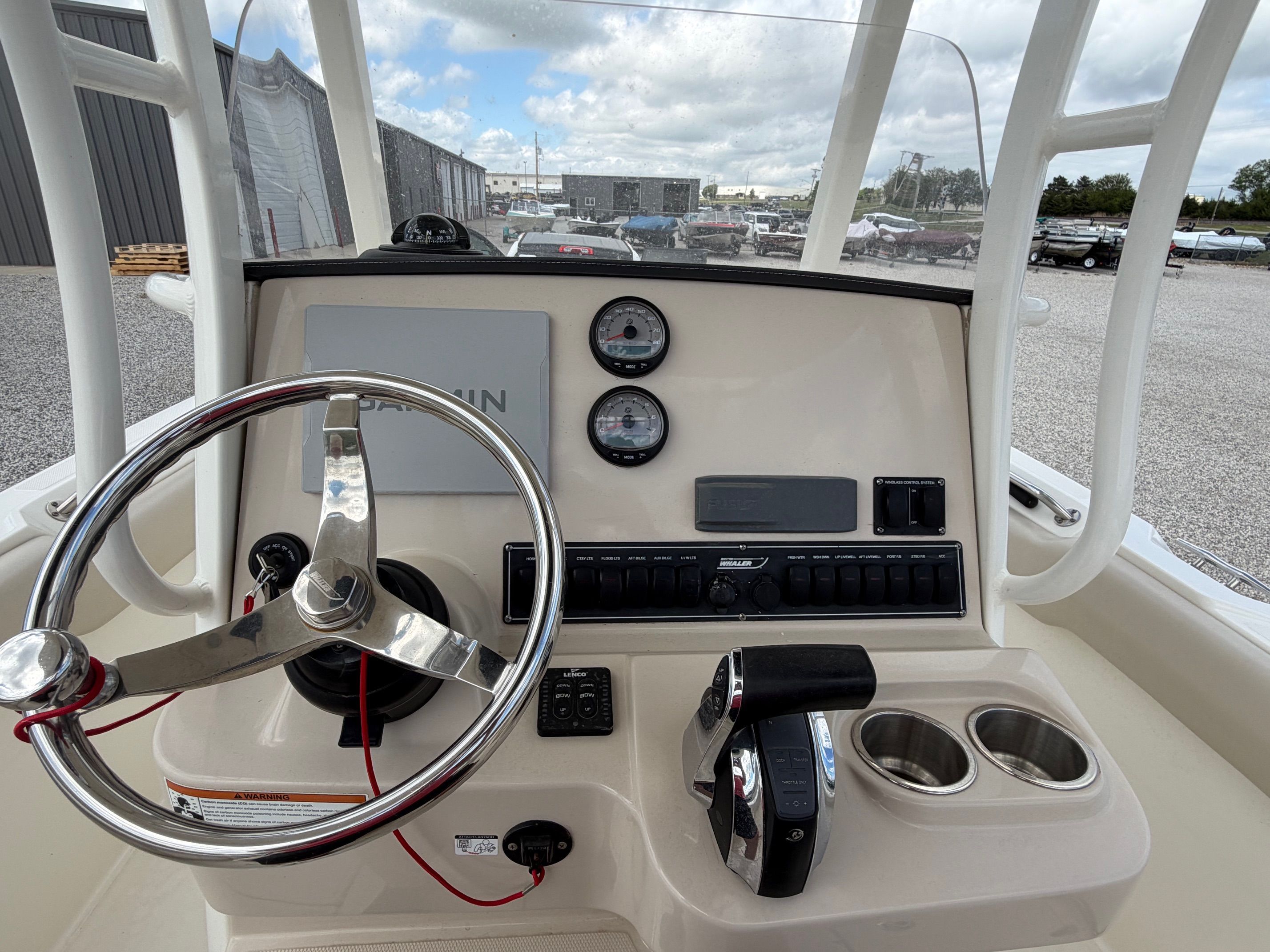 Steering console of a 2020 Boston Whaler 230 Outrage boat.