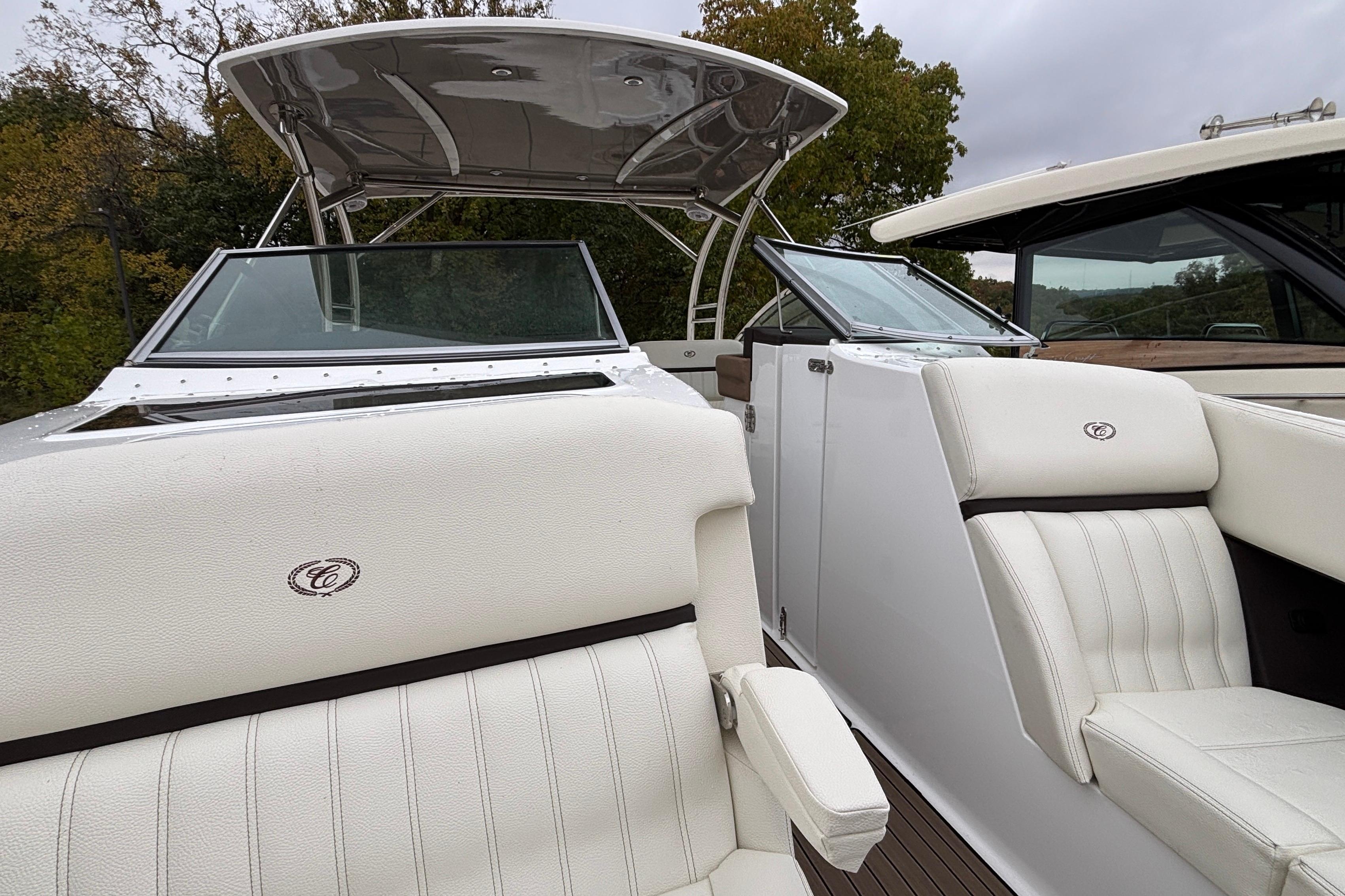 2022 Cobalt R35 boat interior with white leather seating and sleek design.