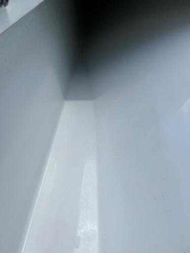 Close-up of a 2022 Yellowfin 39 Offshore boat's sleek interior surface.
