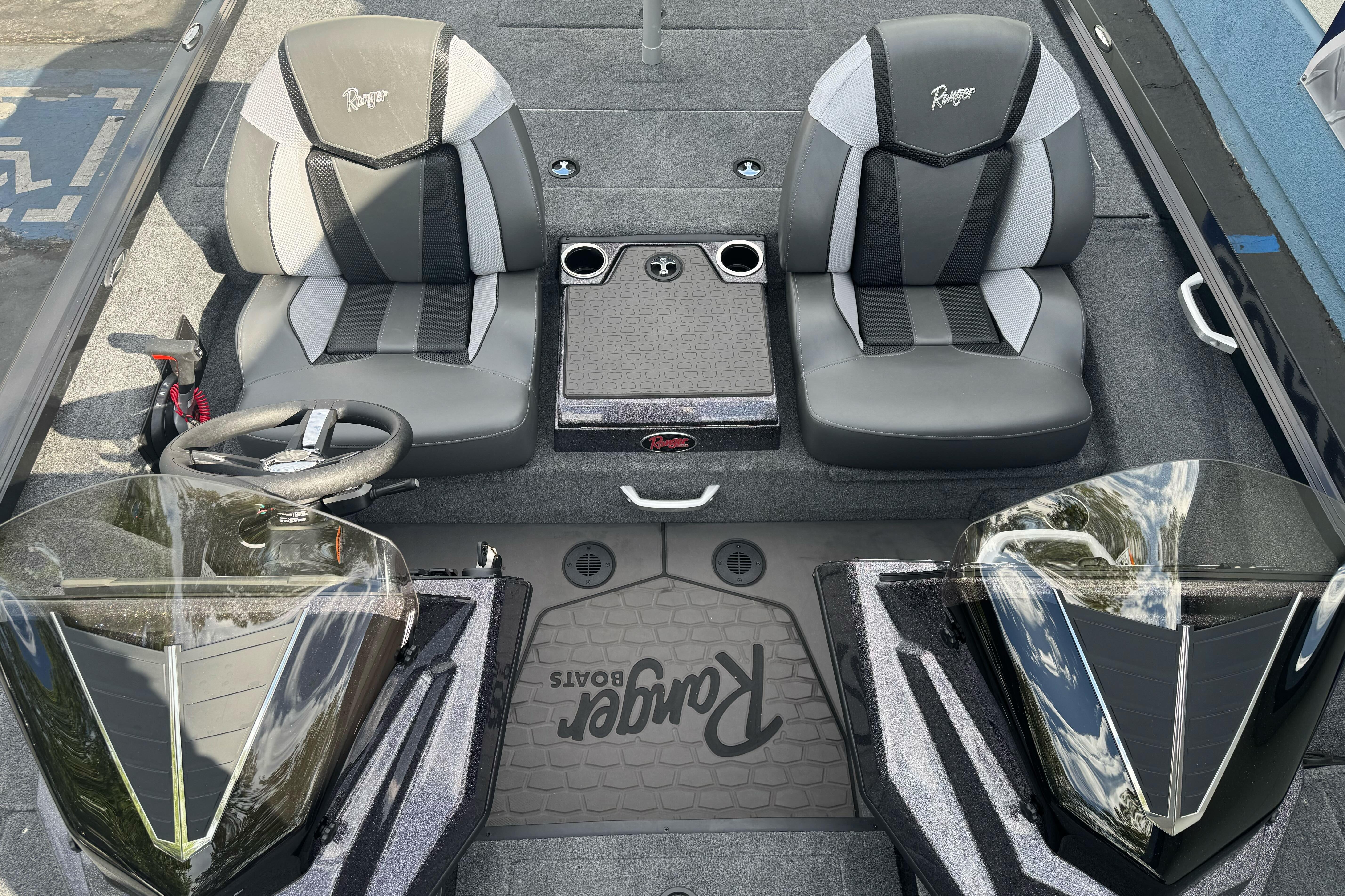 Interior of 2026 Ranger ALPHA 208 boat with dual seats and steering console.