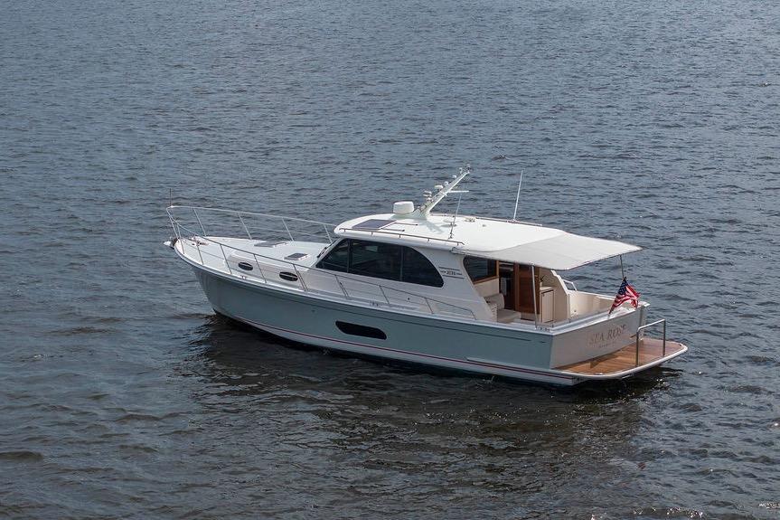 2024 Grand Banks 44 Eastbay yacht cruising on open water.