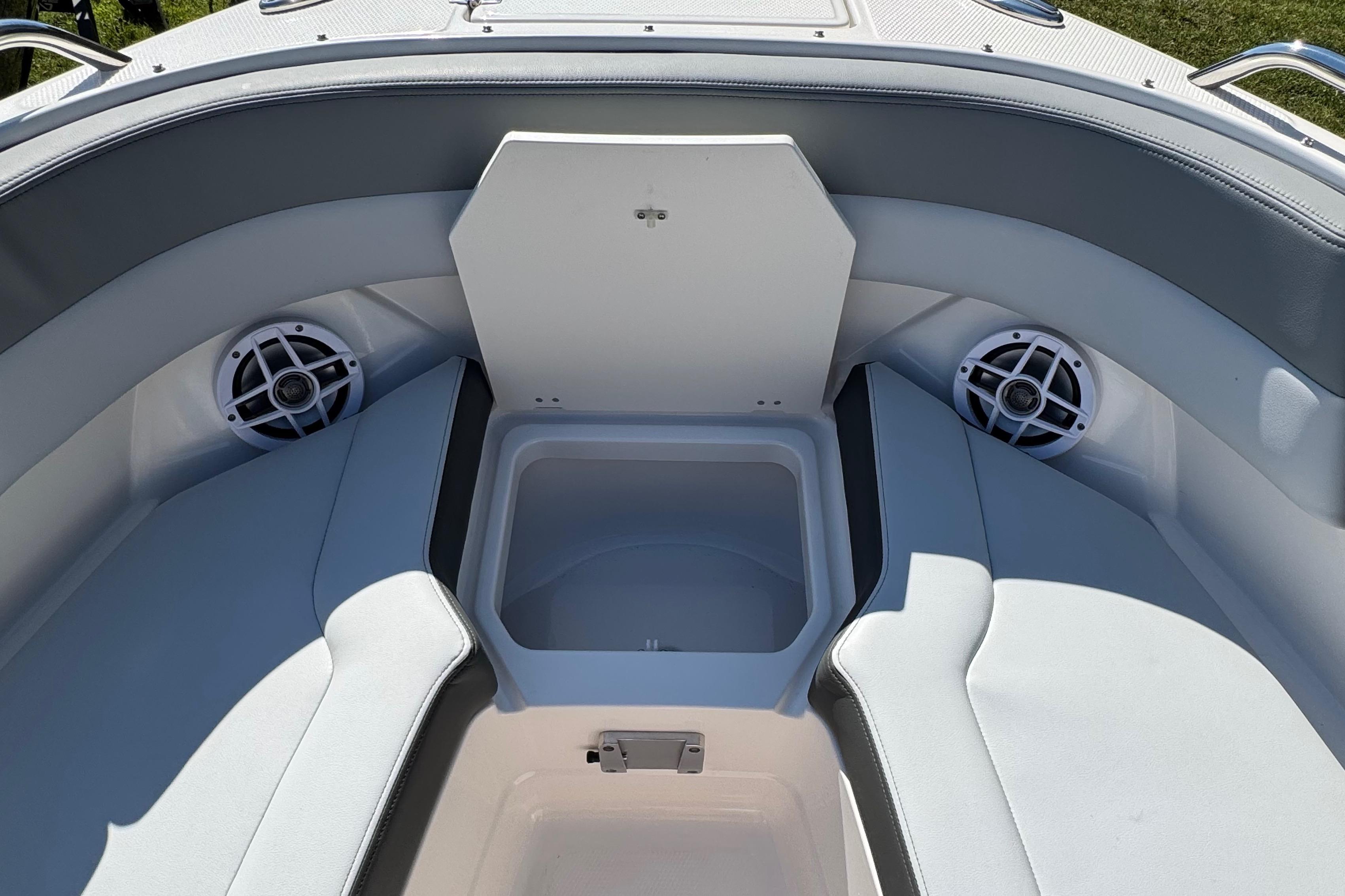 Interior of 2026 Chaparral SSX 4 boat with seating and speakers.