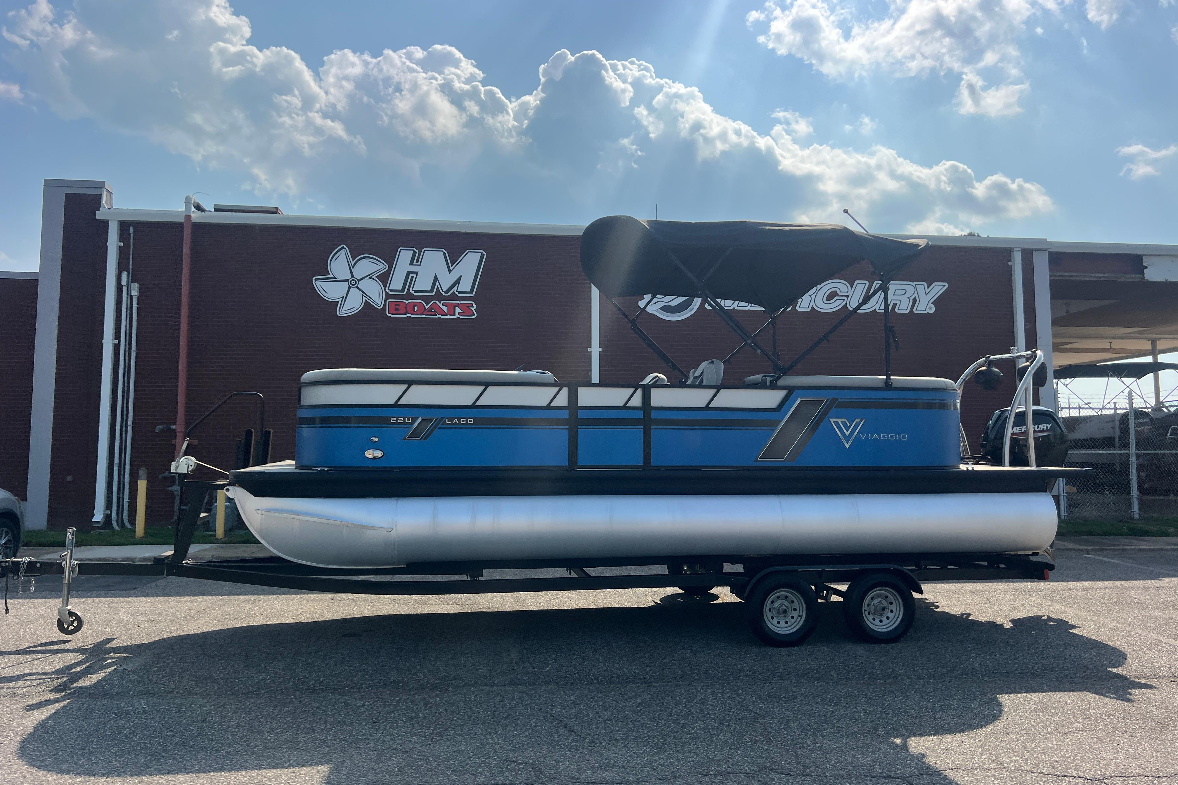 2022 Viaggio Lago V-U 22 pontoon boat on trailer at HM Boats dealership.