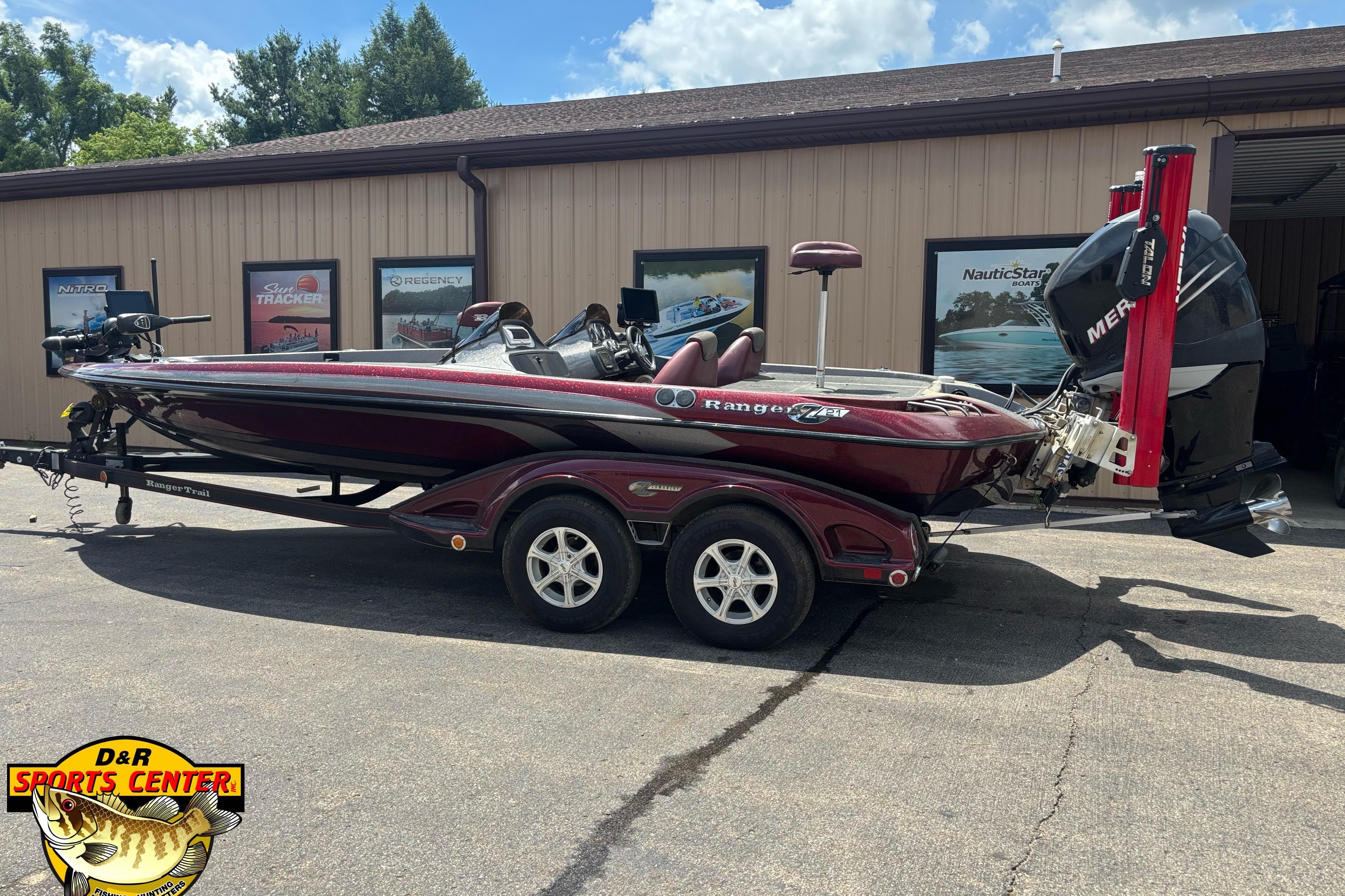 2005 Ranger Z21 Comanche boat on trailer outside D&R Sports Center.