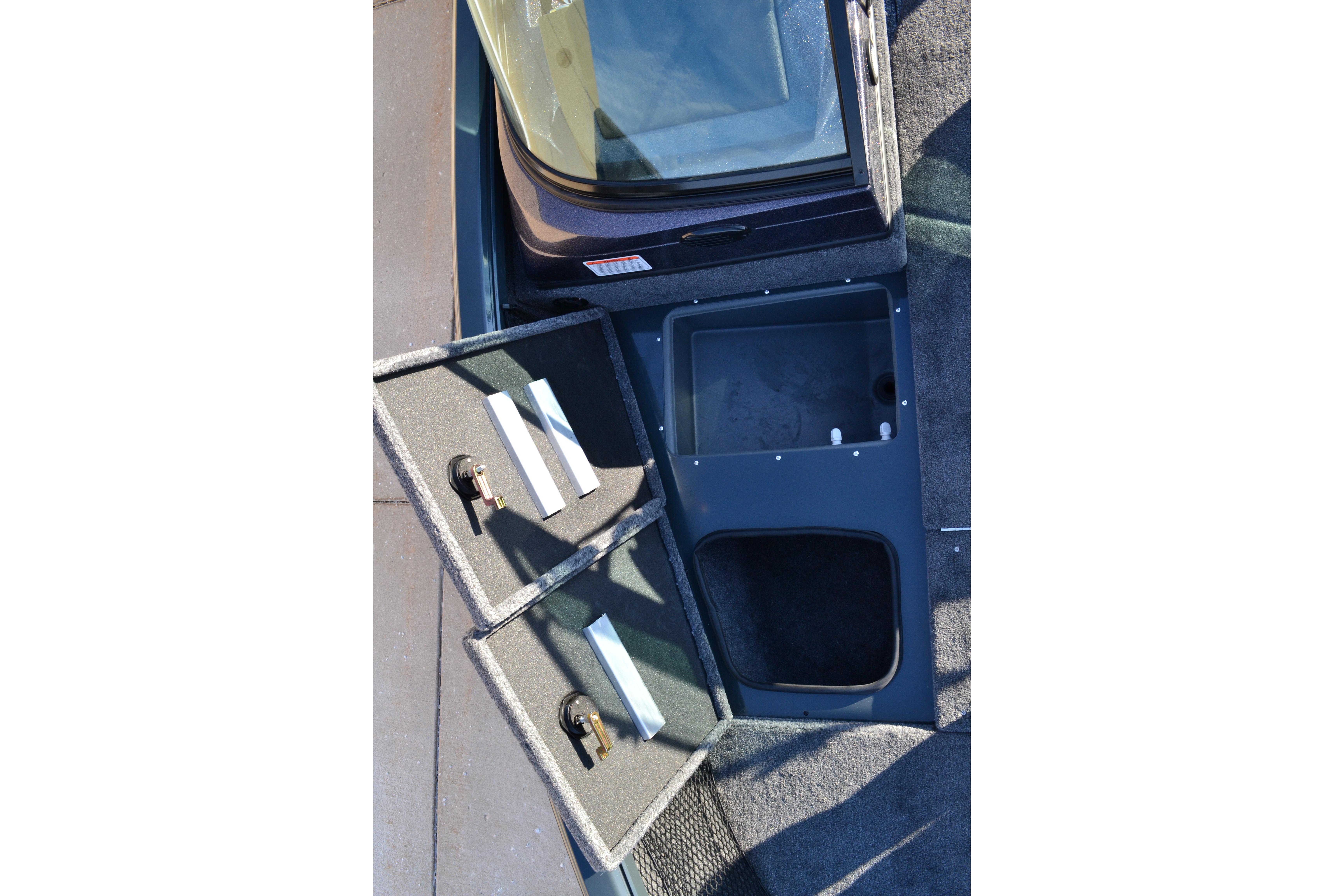 2026 Ranger VS1882SC Reata boat storage compartments open, showcasing interior space.