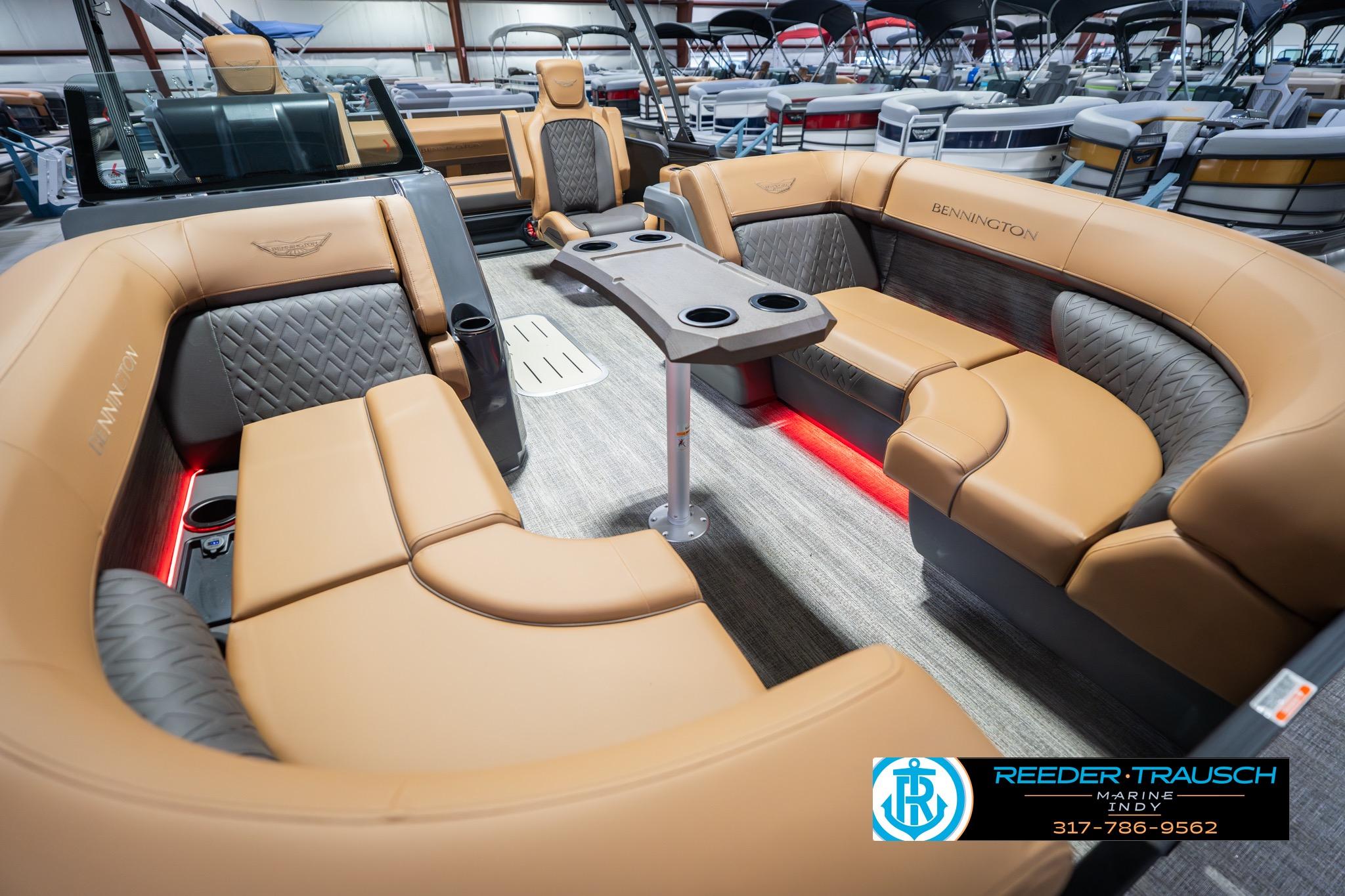 2026 Bennington 22 MSB pontoon boat interior with luxurious tan seating and modern design.