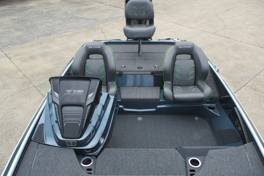 2020 Nitro Z19 Pro boat interior with gray seats and green accents.