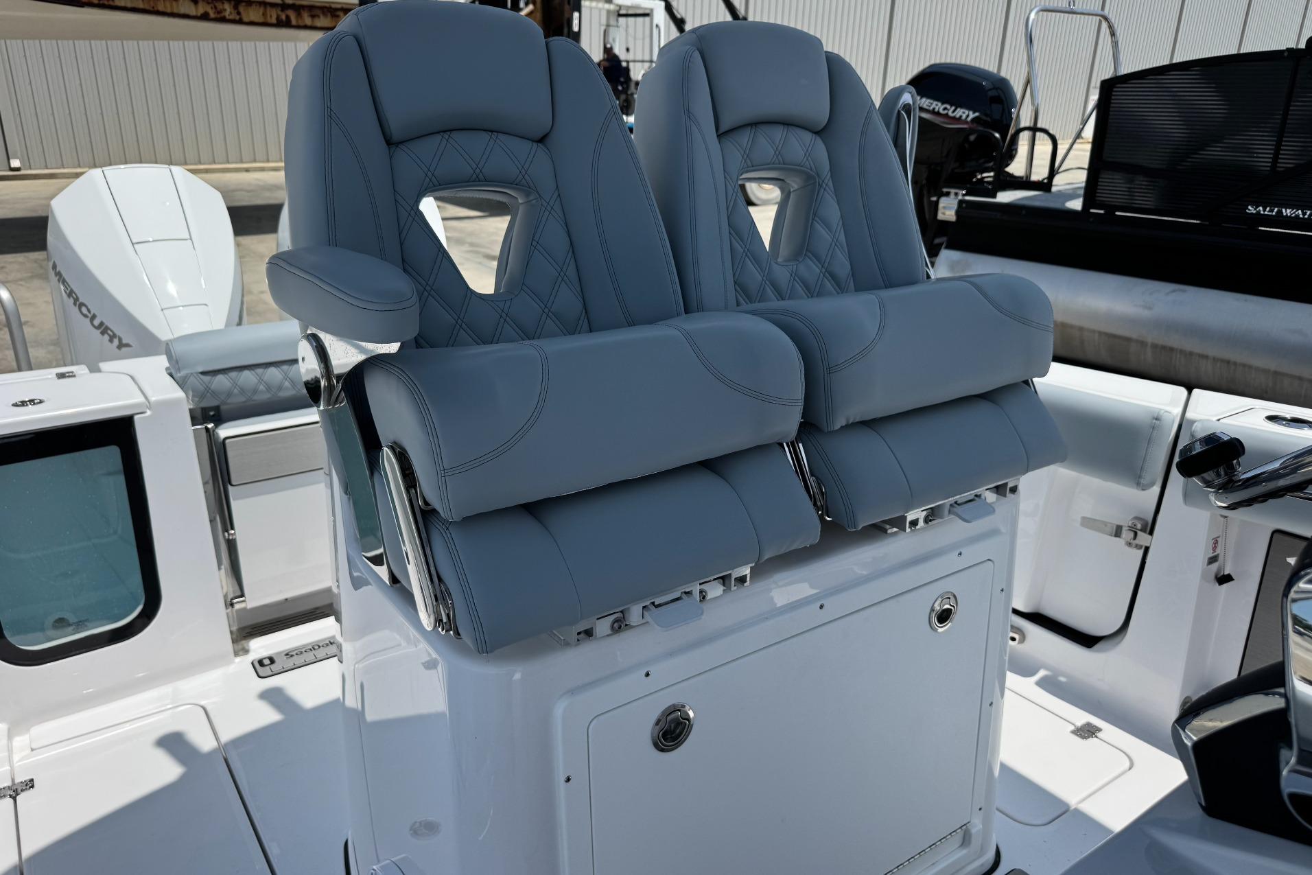 2026 Sportsman Open 262 Center Console boat with dual cushioned seats.