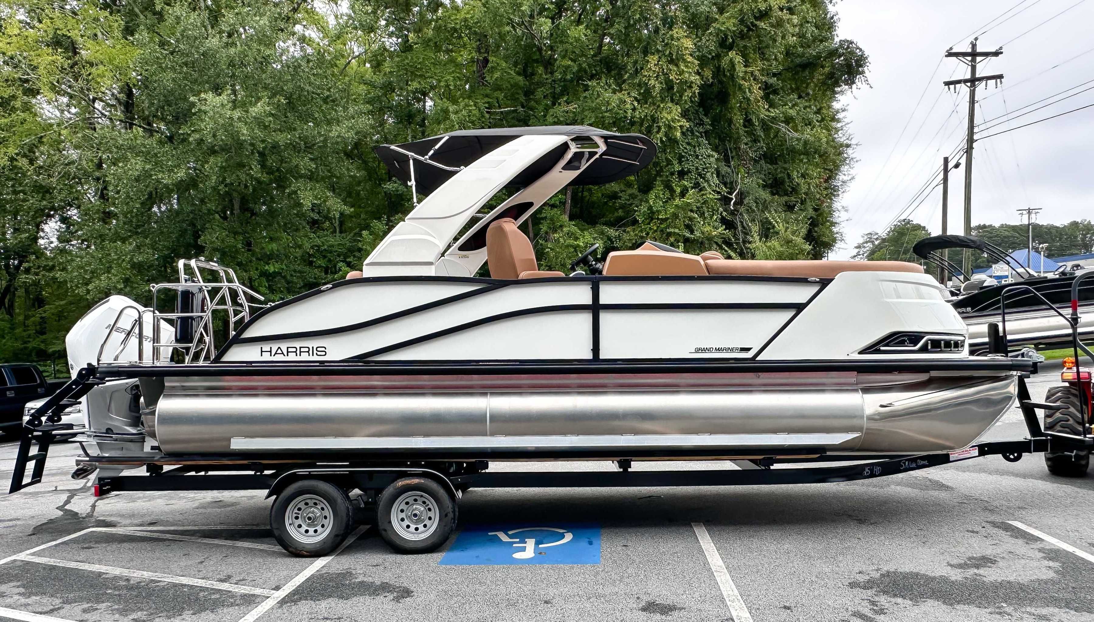 2025 Harris Grand Mariner 230 SLDH pontoon boat on trailer.