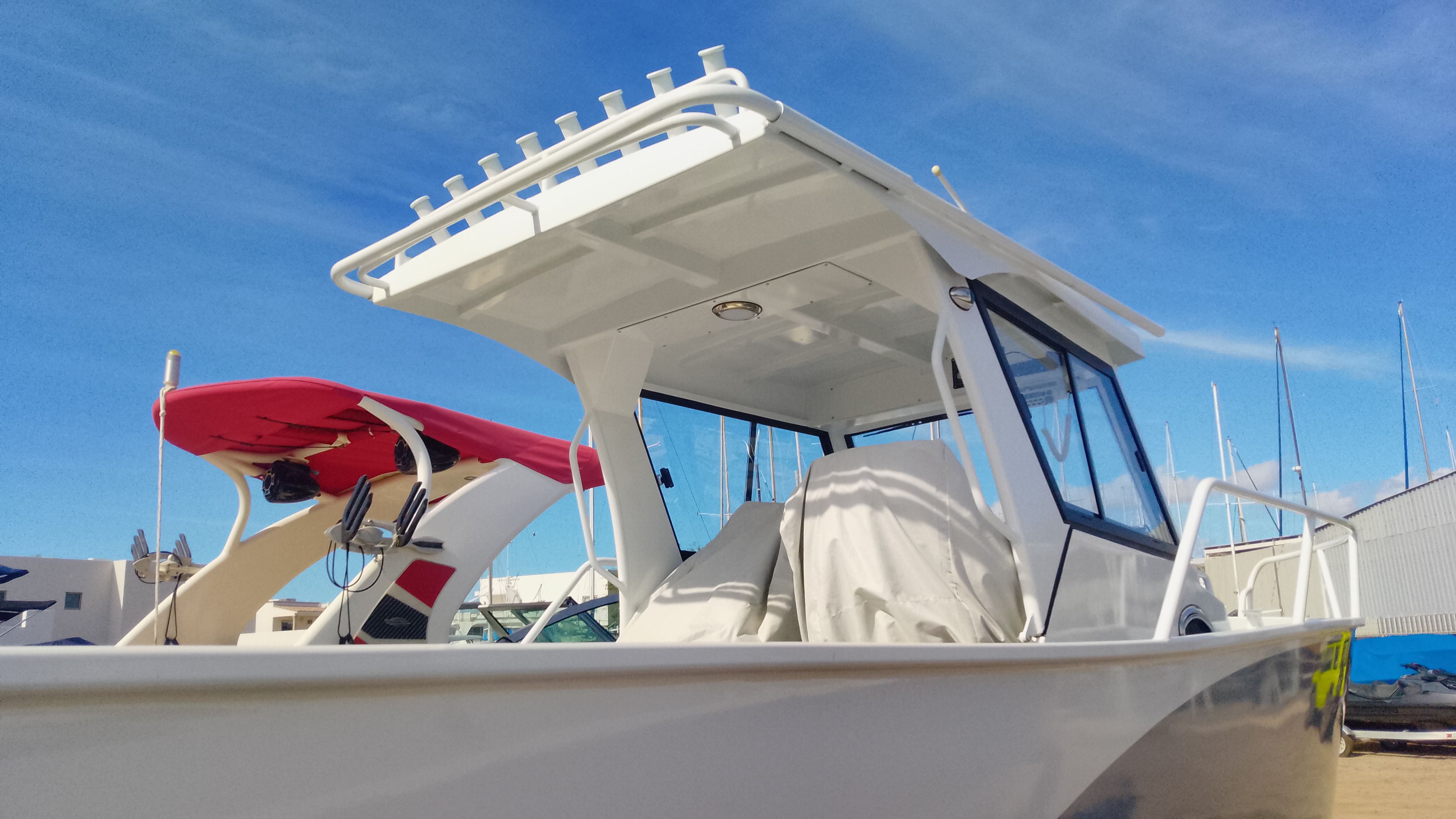 Gospel Boat 7.5M 2024, modern design, blue sky background.
