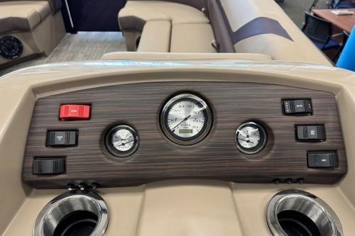 Dashboard of 2026 Bennington 22SXSB boat with gauges and controls.