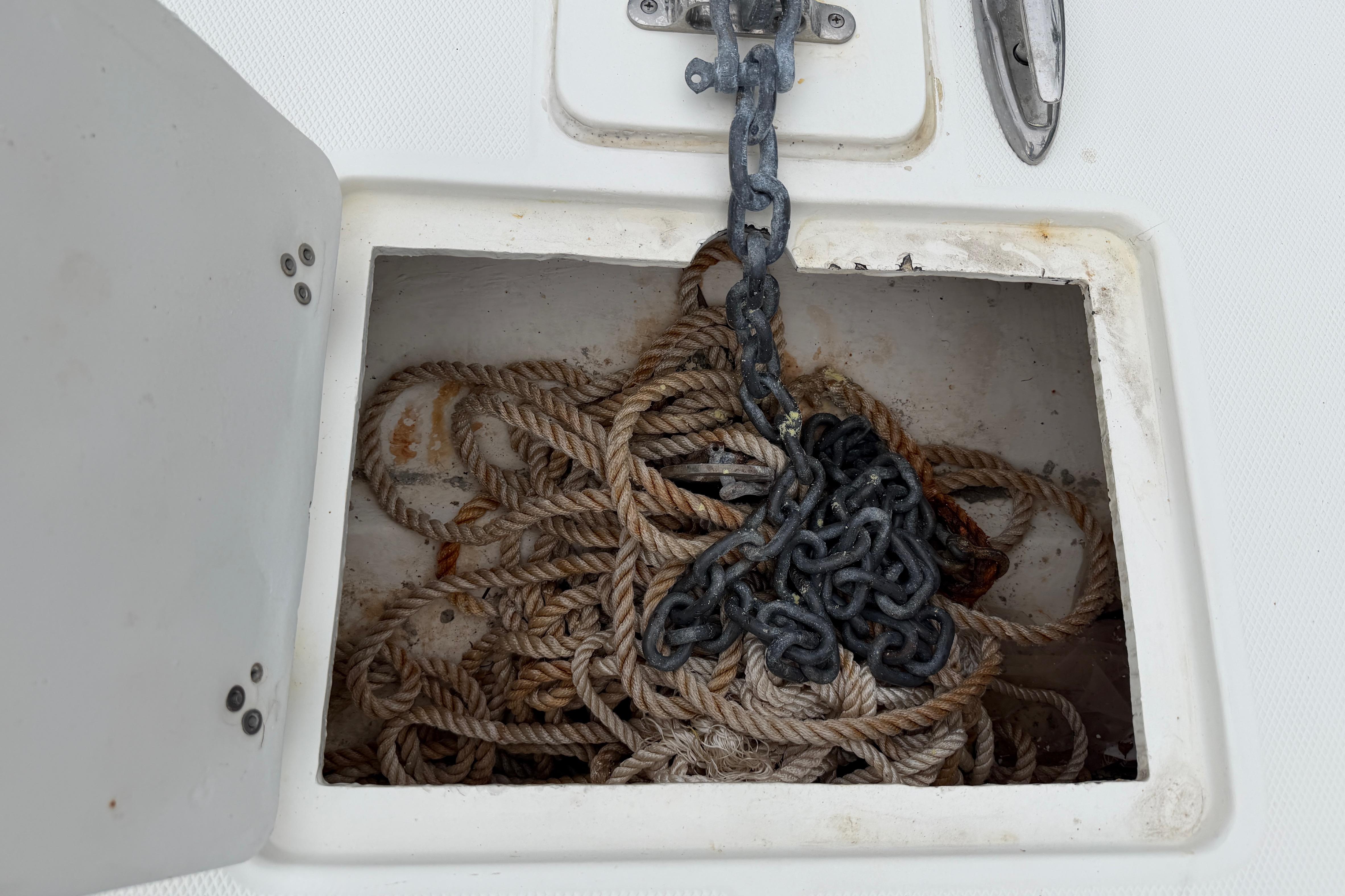 Anchor chain and rope storage on a 2019 World Cat 230 DC boat.
