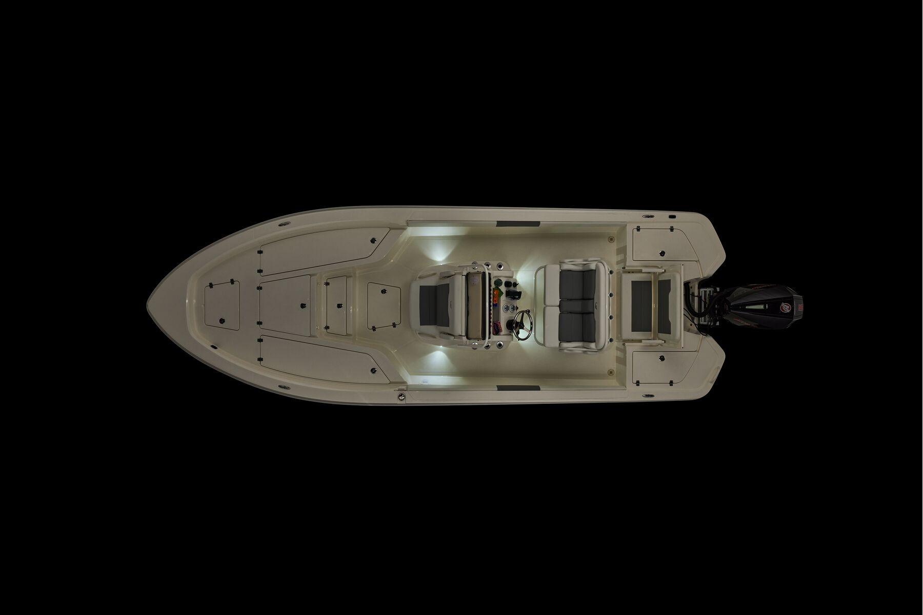 Top view of 2026 Mako 24 APEX boat with illuminated deck and outboard motor.