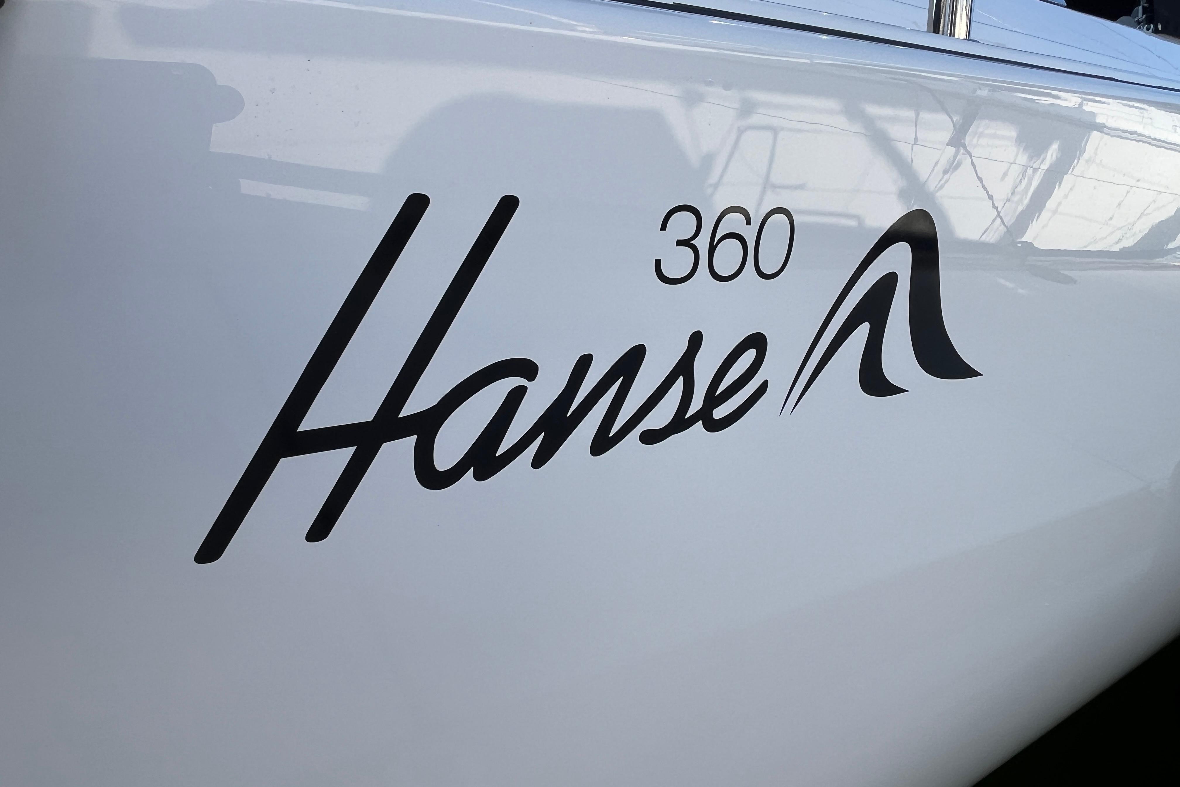 2025 Hanse 360 logo on white boat hull, sleek design.