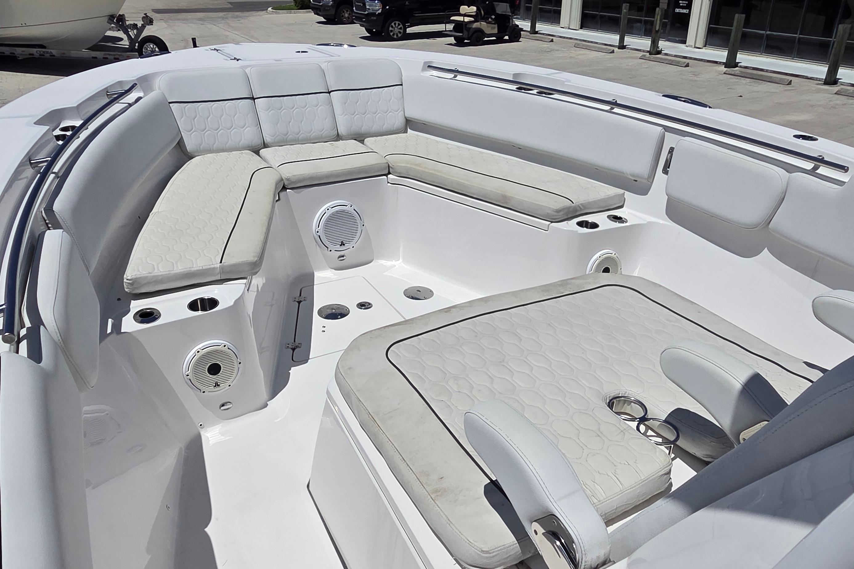 2021 Sea Fox 328 Commander boat interior with cushioned seating and built-in speakers.