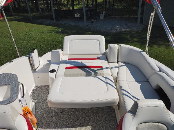 2014 Chaparral 224 Sunesta boat interior with white and red seating.