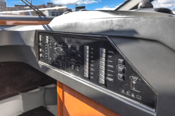 Dashboard of a 2013 Princess V57 yacht with switches and indicators.