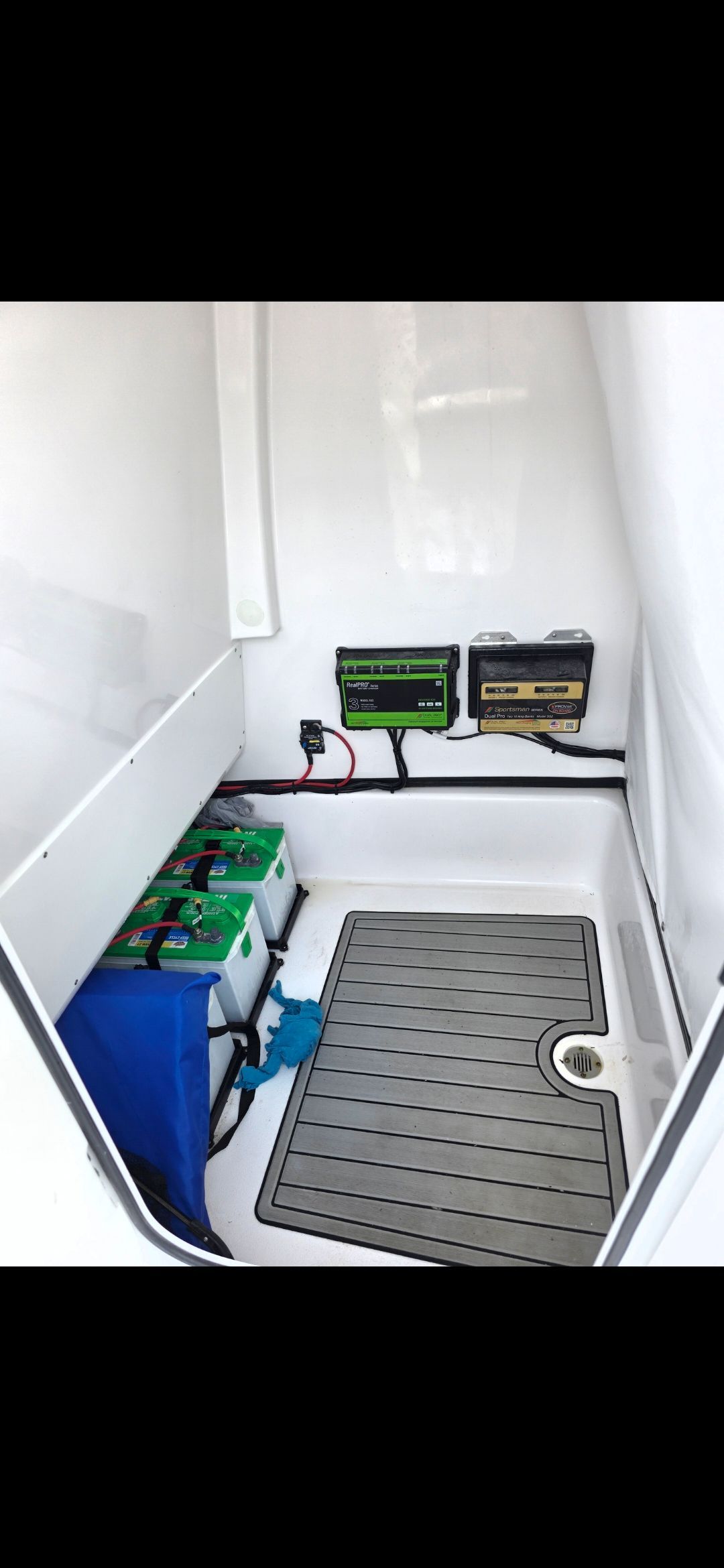 2023 Sportsman Masters 247 Bay Boat battery compartment.