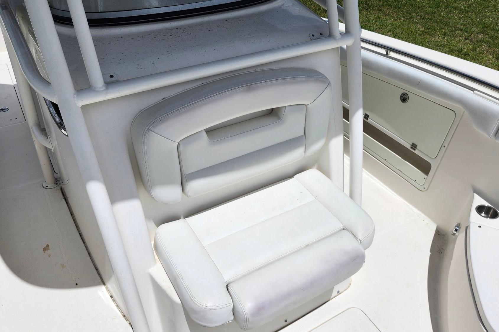 White seating area on a 2015 Robalo R300 Center Console boat.