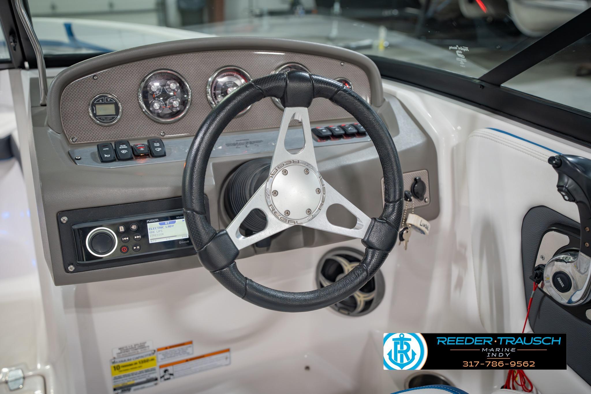 Steering console of 2015 Regal 2000 ESX Bowrider with gauges and controls.