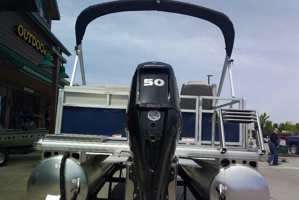 2026 Sun Tracker Bass Buggy 16 XL Select pontoon boat with Mercury 50 engine.