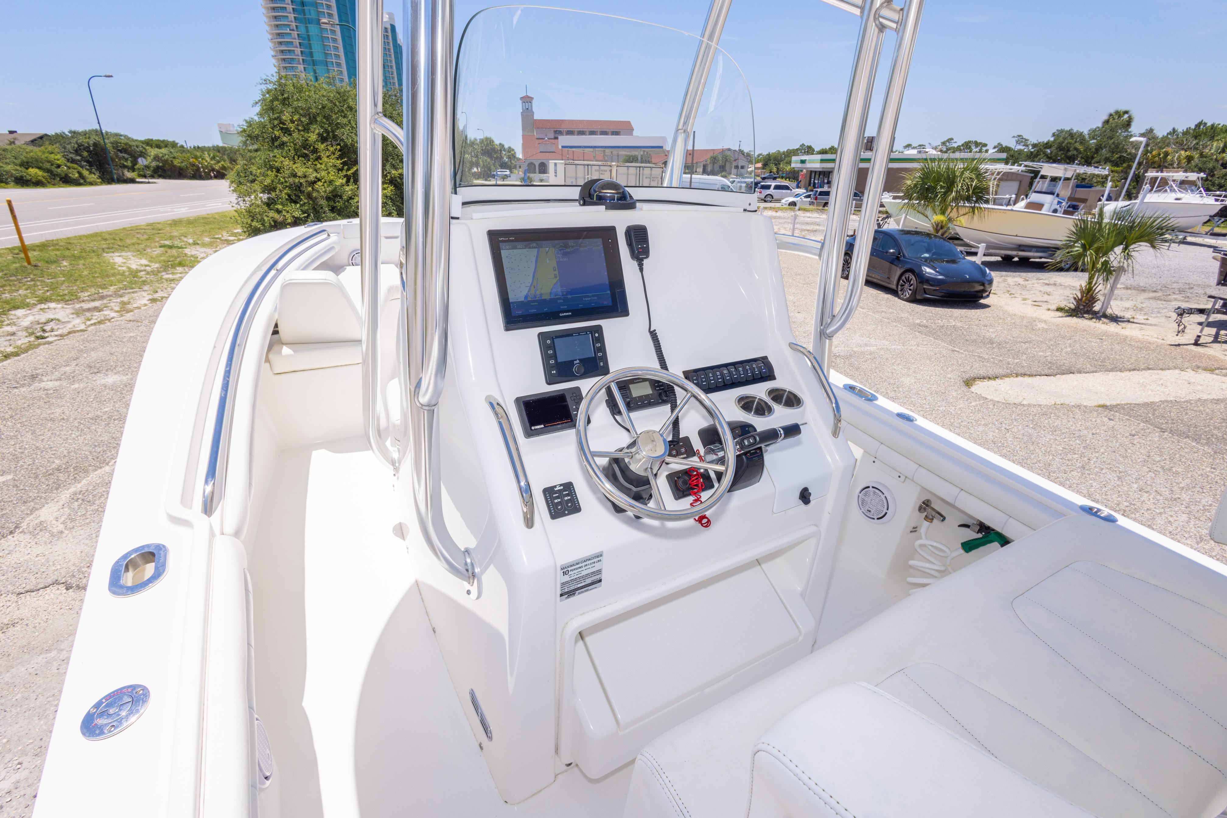 2019 Regulator 23 Center Console boat interior with steering wheel and navigation system.