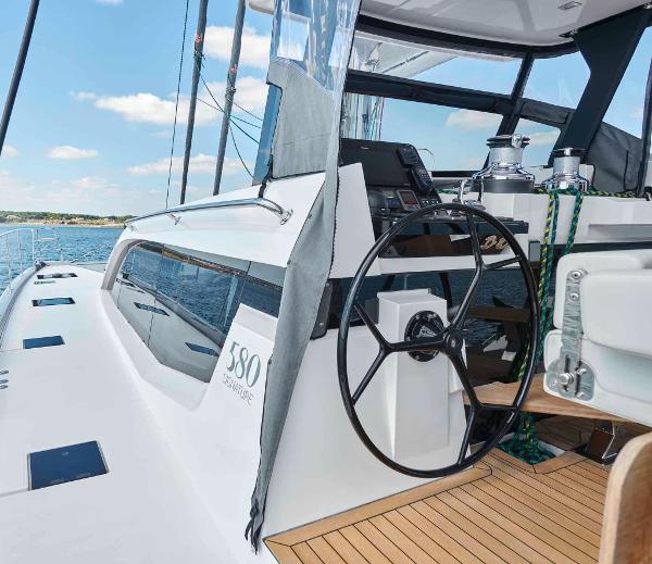 Luxury Privilege Signature 580 yacht helm, 2025 model, on open water.