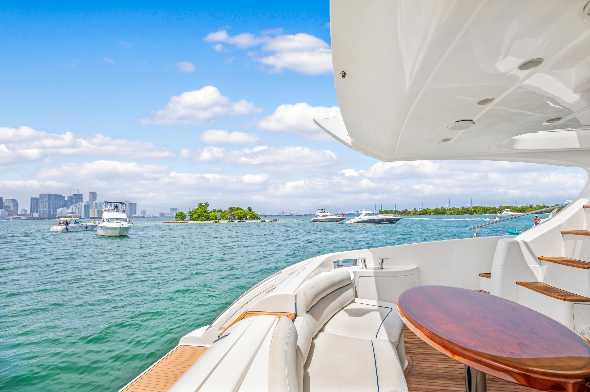 View from the deck of a 2004 Azimut 62 yacht on a sunny day.