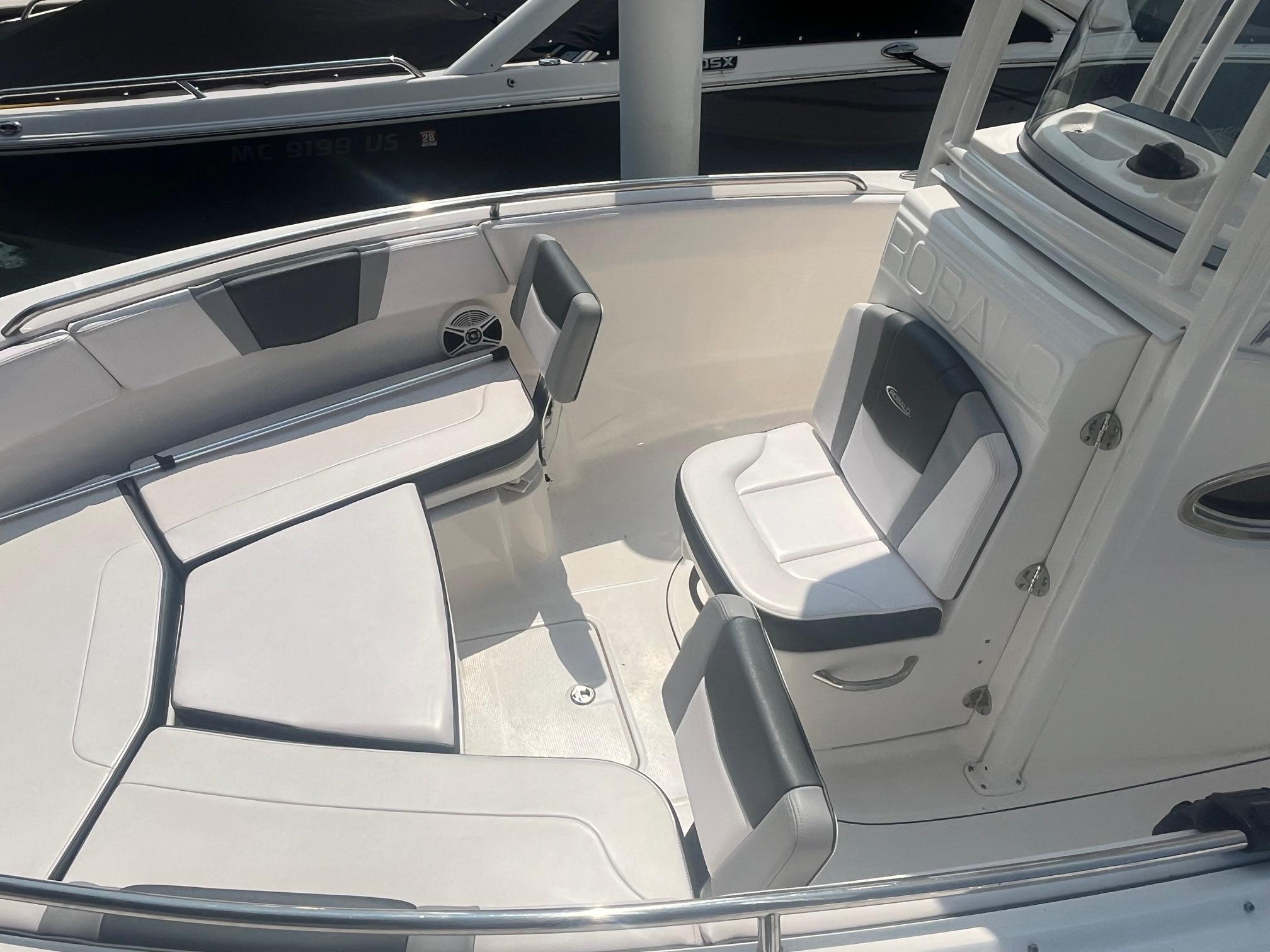 2020 Robalo R230 Center Console boat interior with cushioned seating and sleek design.