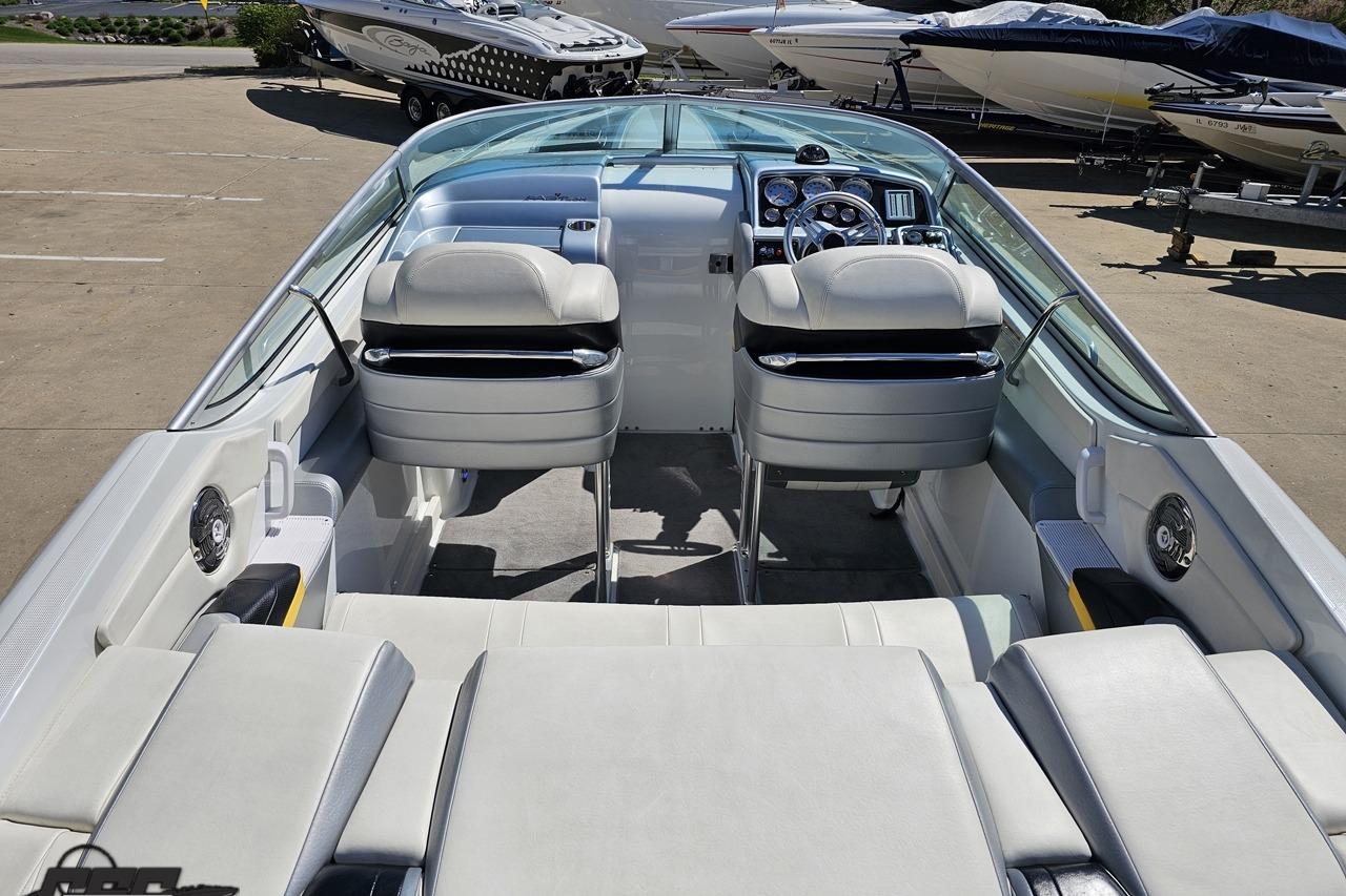 2014 Formula 292 FASTech boat interior with sleek white seating and modern dashboard.
