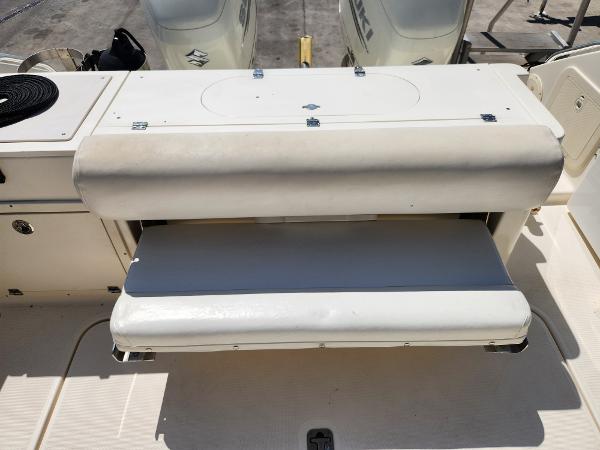 2005 Pursuit 3070 Offshore Center Console boat seat and storage area.
