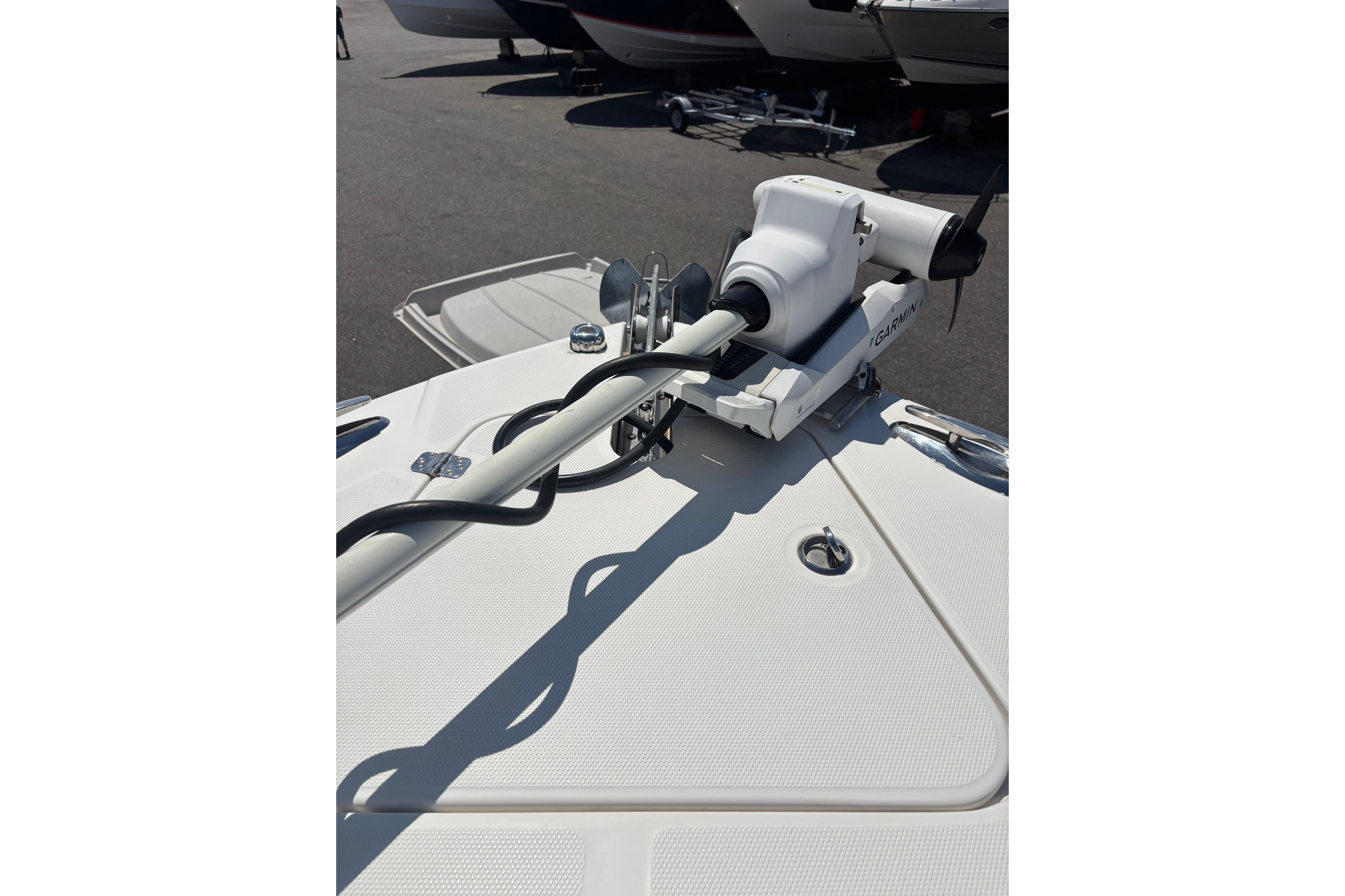 Bow of 2006 Edgewater 318CC boat with Garmin trolling motor.