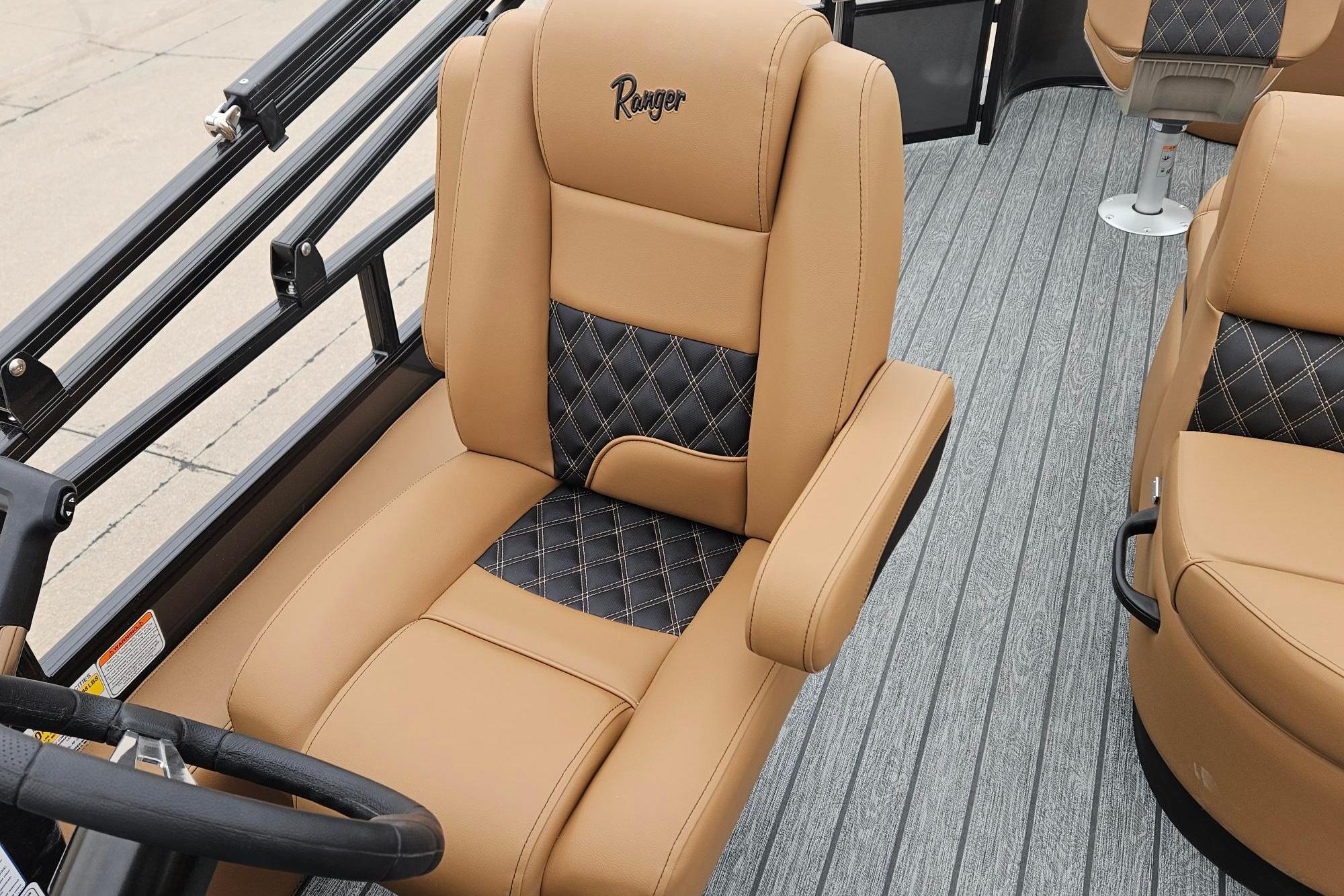 2026 Ranger 220F boat interior with tan and black diamond-stitched seating.