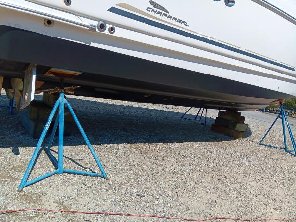 2004 Chaparral Signature 350 boat on stands for maintenance.