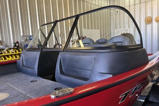 2026 Tracker Pro Guide V-16 WT boat in a storage facility.