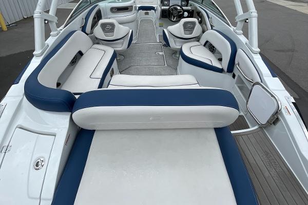 2023 Crownline E235 boat interior with spacious seating and modern design.