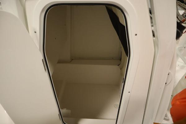 2025 Sea Fox 228 Commander interior cabin space, open door view.