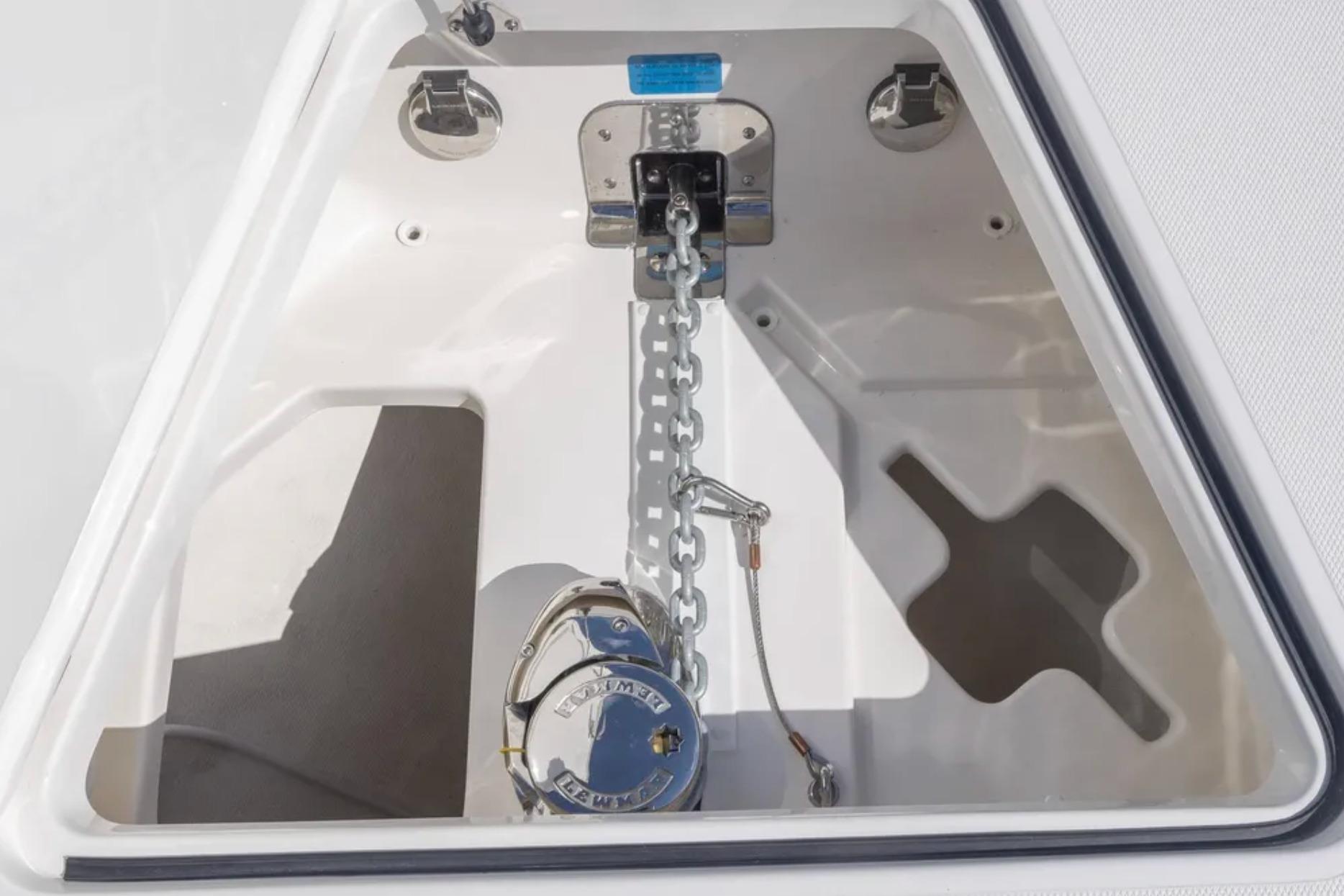 Anchor compartment of 2025 Blackwater 41 Performance Fish boat, featuring chain and winch.